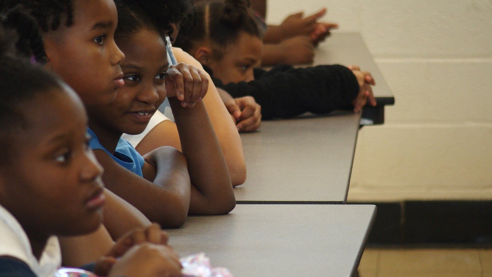 Students at Willow Oaks Elementary School in Memphis watch a performance facilitated by Cazateatro bilingual theater group during Shelby County Schools summer learning academy.