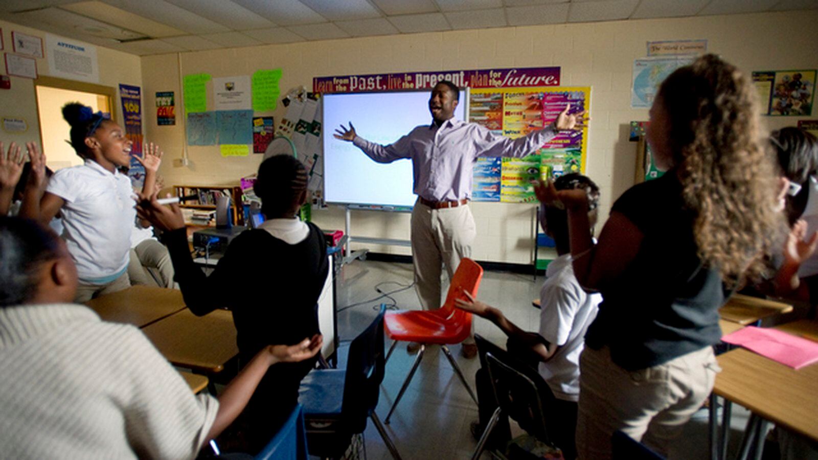 Sixth-grade teacher James Johnson leads his students in a gameshow-style lesson on energy at Chickasaw Middle School  in 2014 in Shelby County. The district was one of three that received a grant from the Gates Foundation to overhaul teacher evaluation.