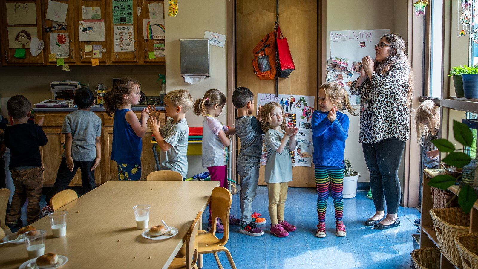 Pre-kindergarten lead teacher Elizabeth Dobrow (right) preps her class to line up before going outside to play at IU Health Day Early Learning Center in Indianapolis on Tuesday, May 14, 2019.