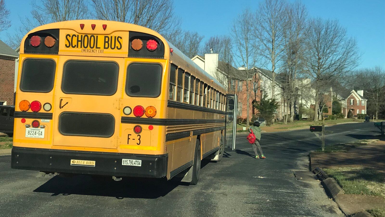 A student steps off the bus Thursday in Williamson County, where two school districts will be closed for two days after a resident was diagnosed with the new coronavirus. Williamson County is located south of Nashville.