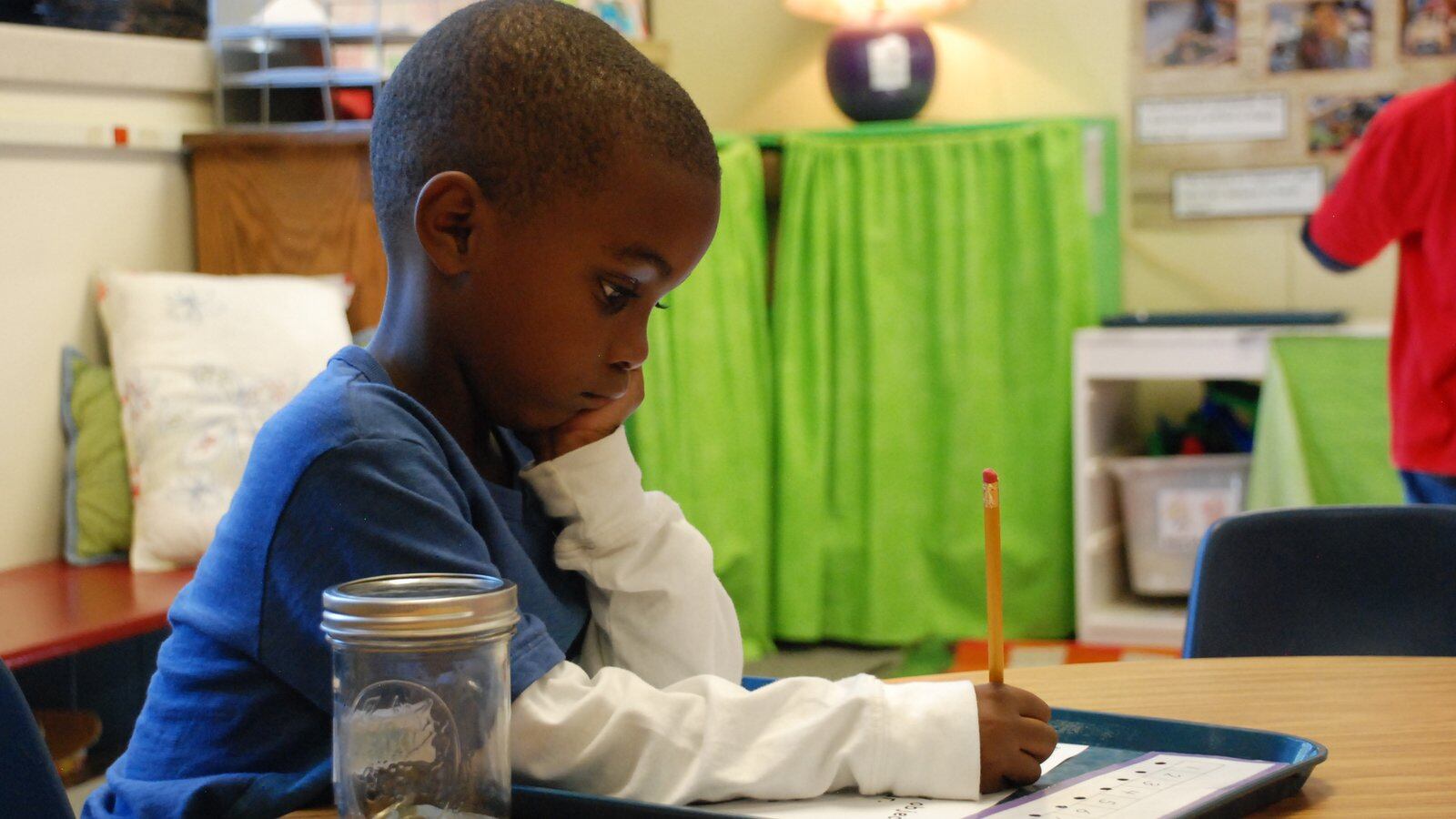 A student works at Tollgate Elementary School in Aurora. (Photo by Nic Garcia, Chalkbeat)