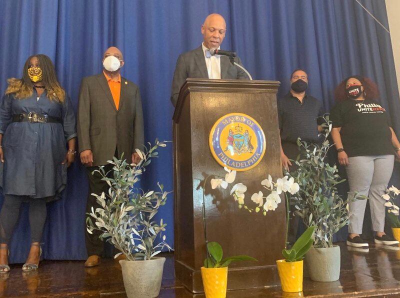 Superintendent William Hite, center, with Robin Cooper, left, president of Teamsters Local 502/CASA, Jerry Jordan, president of Philadelphia Federation of Teachers, Royce Merriweather, of the union representing school safety officers and Nicole Hunt, right, president of Local 634.