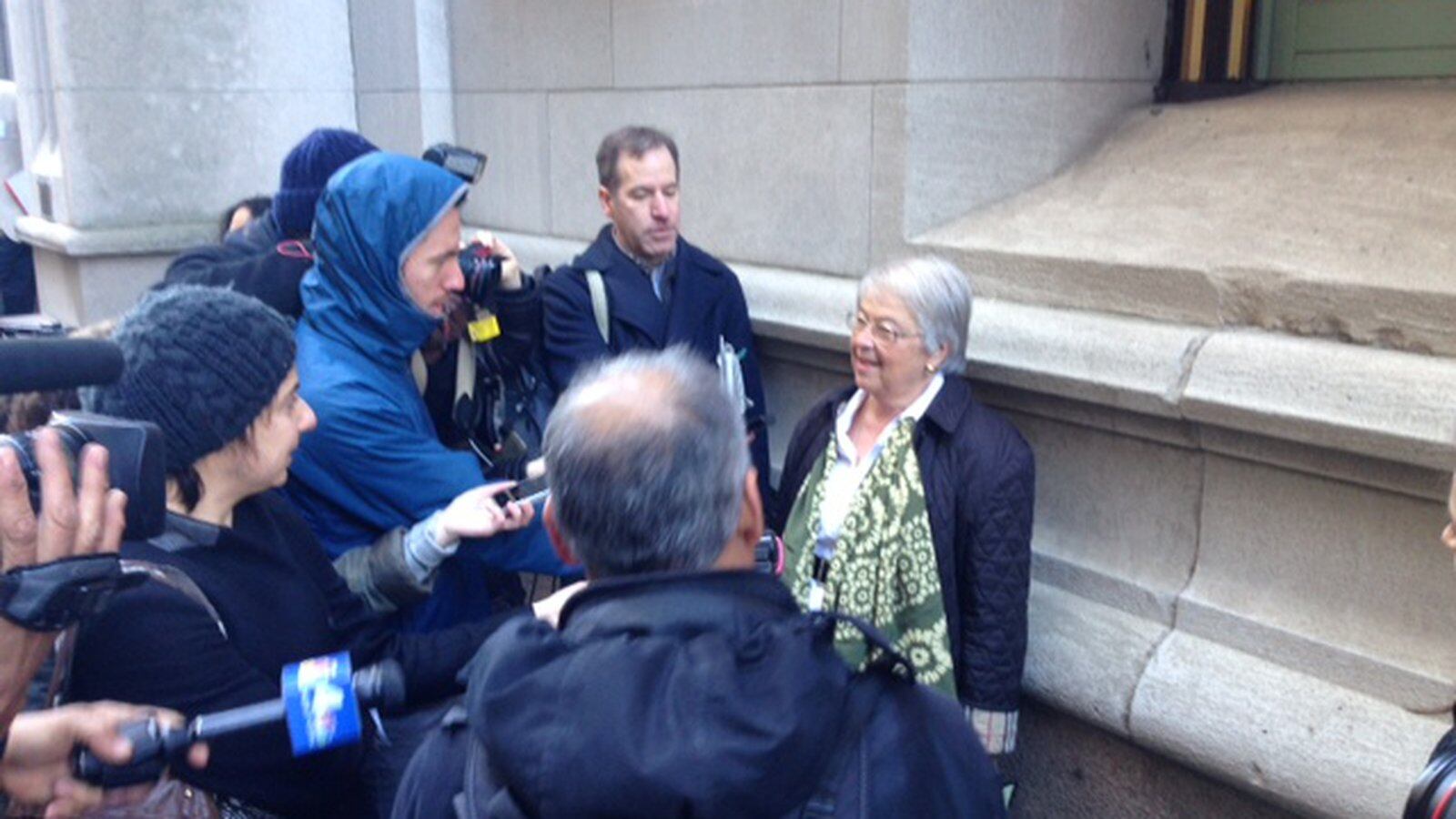 A larger press scrum than normal questions Chancellor Fariña after leaving a meeting with charter school leaders.