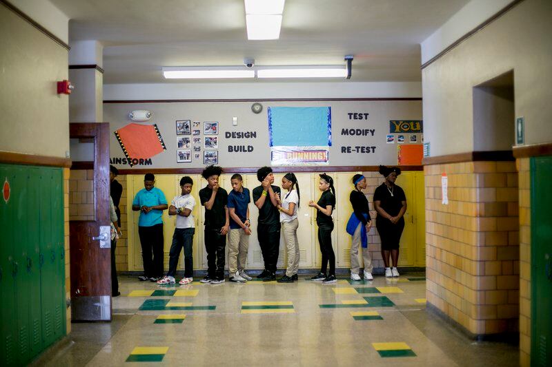 The students of Bethune Elementary-Middle School’s homeroom 8B line up to go to lunch. Collectively, 31 students in the class attended 128 schools by the time they reached eighth grade.