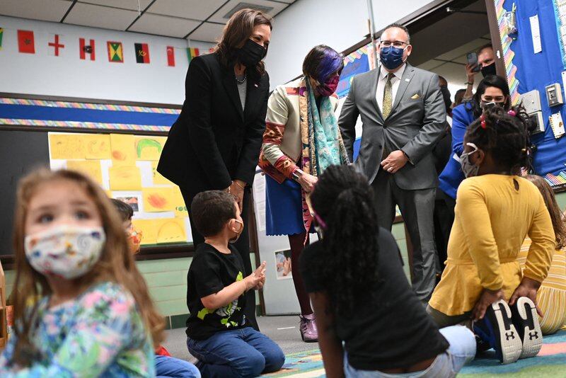 U.S. Vice President Kamala Harris, Education Secretary Miguel Cardona (R), and US Representative Rosa DeLauro (C) visit a classroom in the West Haven Child Development Center in West Haven, Connecticut on March 26, 2021.