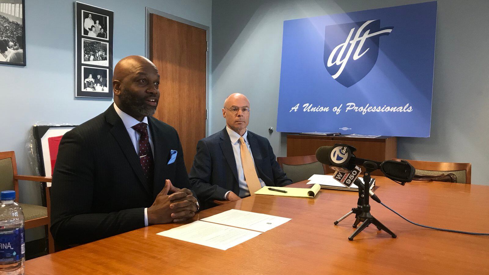 Terrence Martin, left, president of the Detroit Federation of Teachers, announced a tentative salary agreement Tuesday morning.