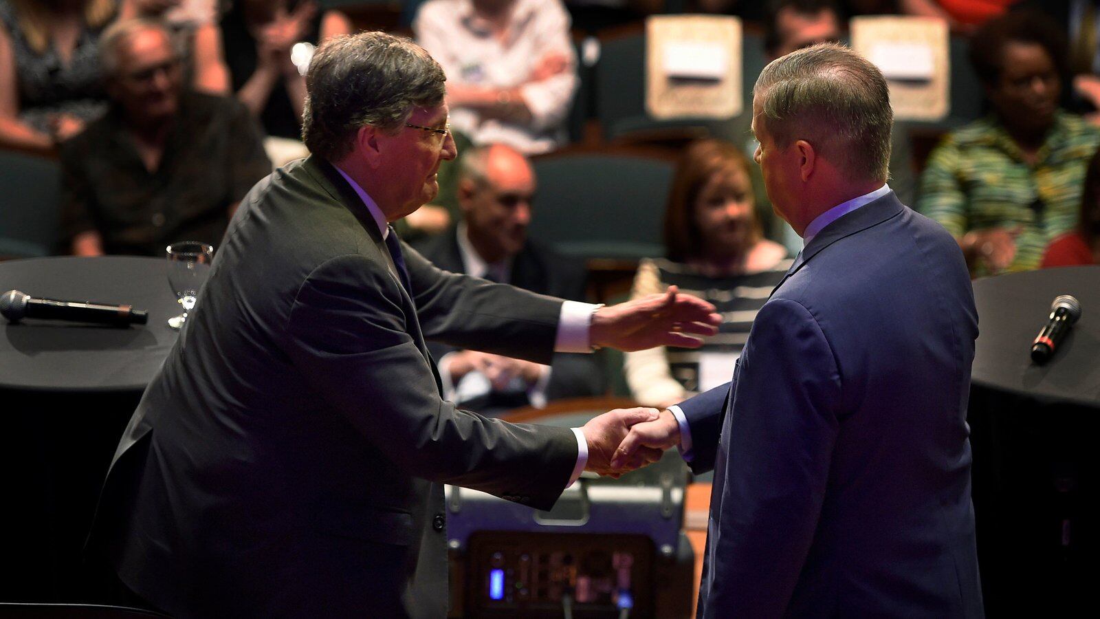 House Minority Leader Craig Fitzhugh shakes hands with former Nashville Mayor Karl Dean, right, after the Tennessee Democratic gubernatorial debate on June 19 at Belmont University in Nashville.