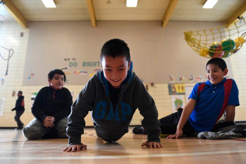 Students during PE class at Lyn Knoll Elementary School in 2016 in Aurora, Colorado. (Photo by Helen H. Richardson/The Denver Post)