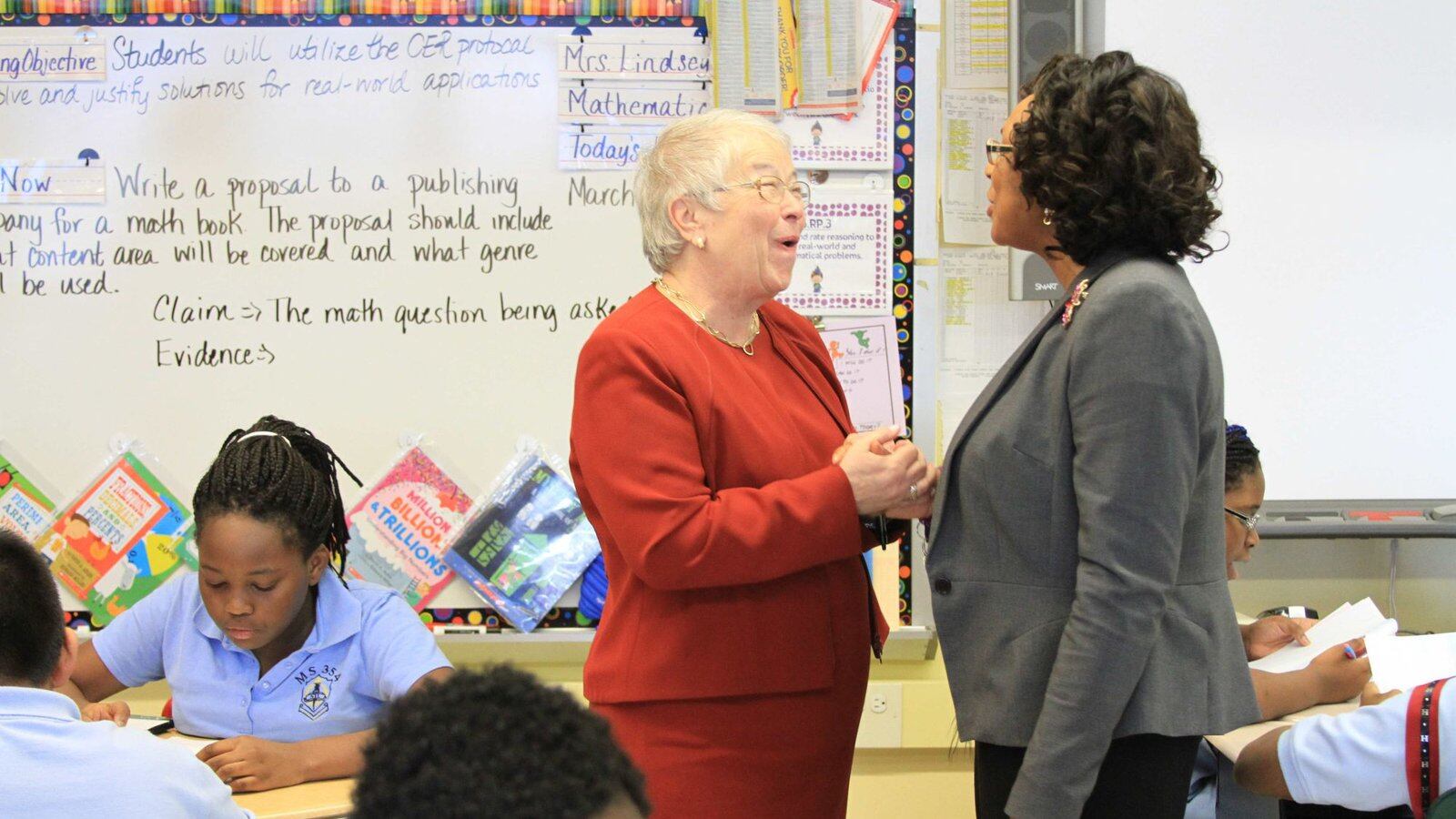 Chancellor Carmen Fariña speaks with Monique Campbell, the principal of The School of Integrated Learning, one of the city schools that will begin absorbing a struggling middle school next year.