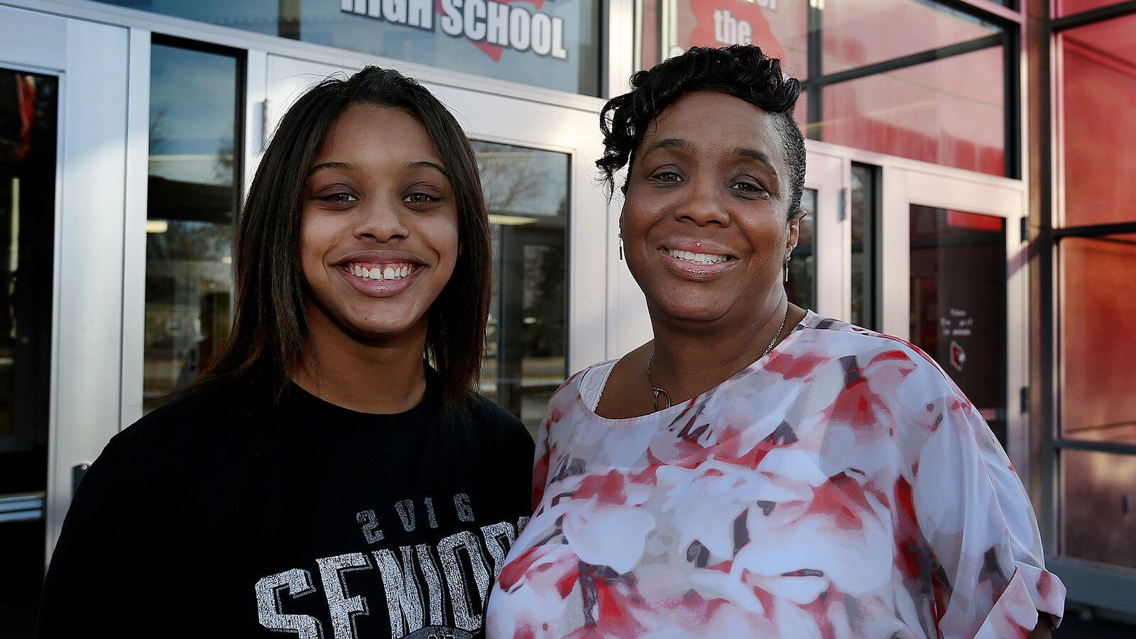 LaTonya Kirkland, right, and her daughter LaShawn have been directly affected by Indianapolis' decades-long effort to desegregate the city's schools. LaTonya was part of the first class of students to be bused to Perry Township from IPS back in the 1980s, and LaShawn was in the last class. She graduated this spring from Southport High School.