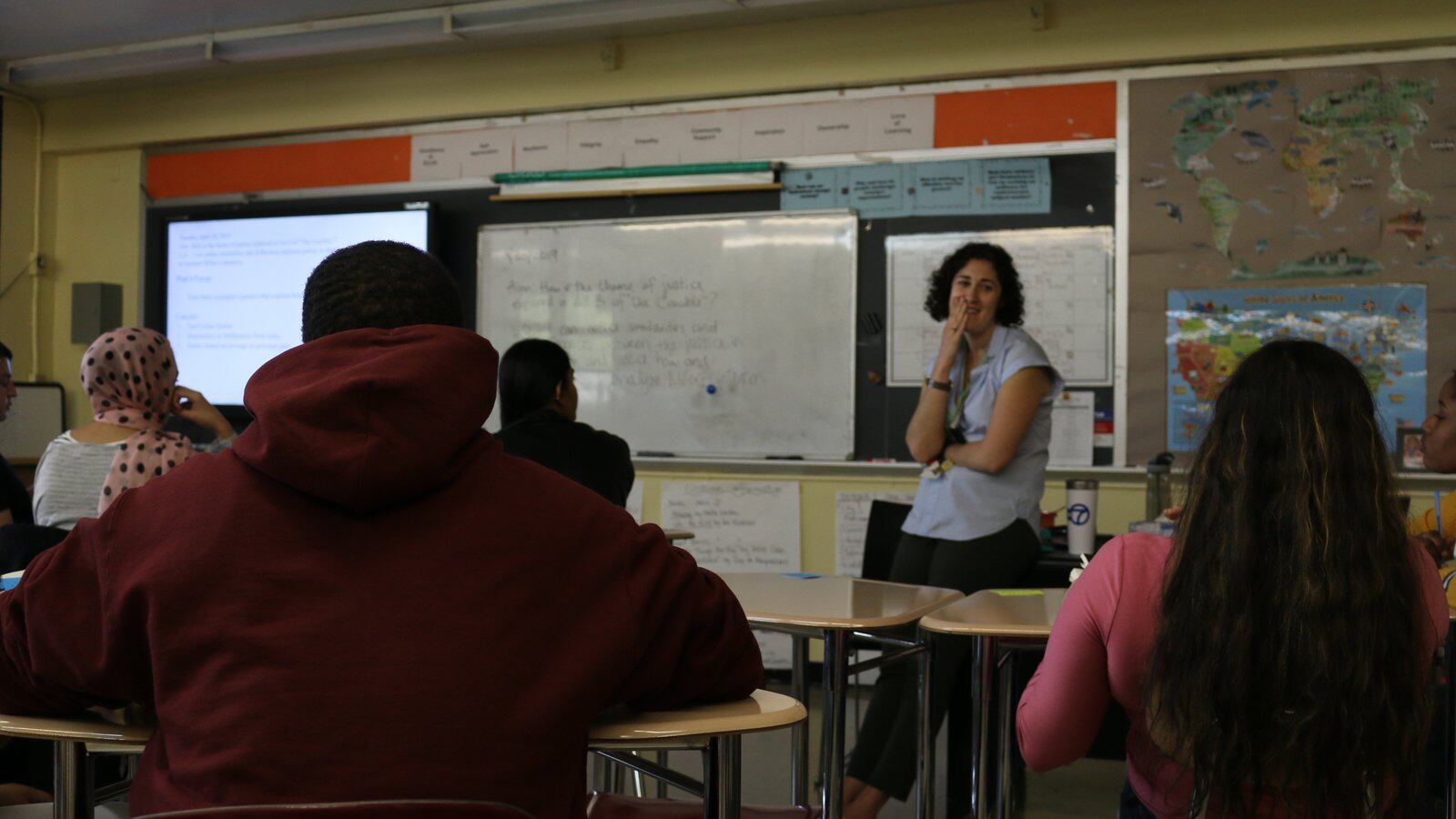 An English teacher chats about “The Crucible” with her class at ELLIS Prep Academy in the Bronx, a transfer school that serves immigrant students.