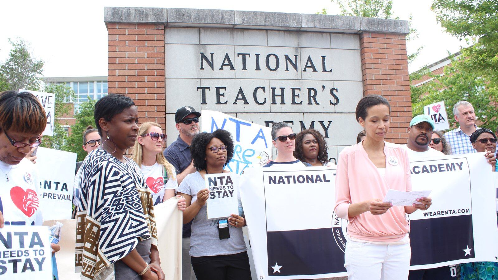 Elisabeth Greer, a parent and leader at the National Teachers Academy, speaking at a press conference in June about parents' lawsuit to stop CPS from displacing NTA with a new high school.