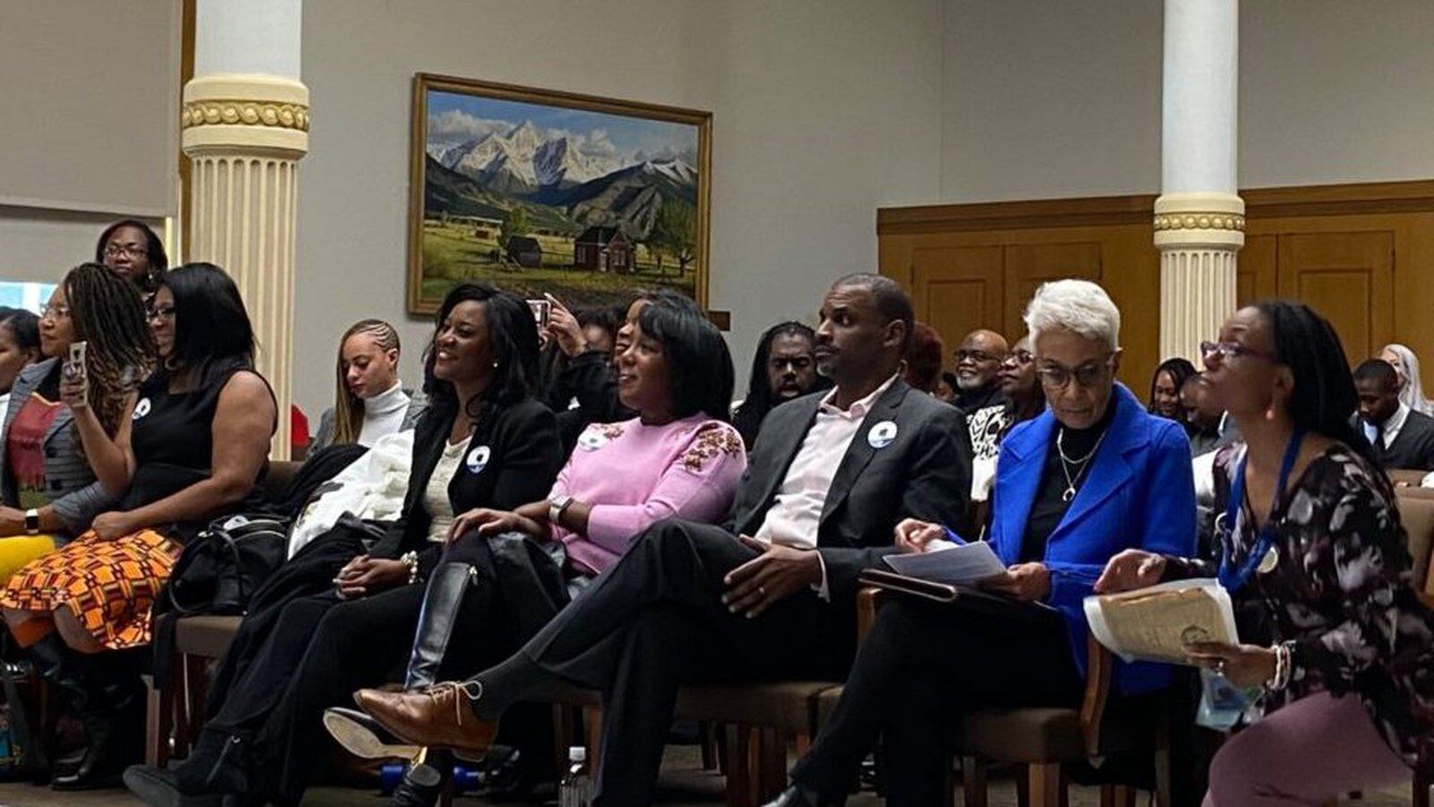 Community members and civic leaders wait to testify in support of the Colorado Crown Act, which would ban discrimination against natural hairstyles at work and in school.