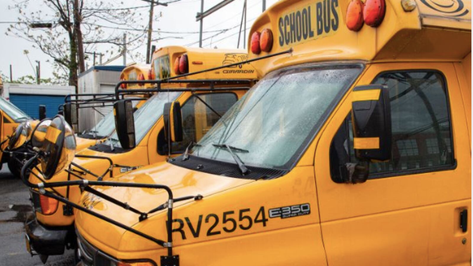 Yellow school buses parked in a Brooklyn depot in April.