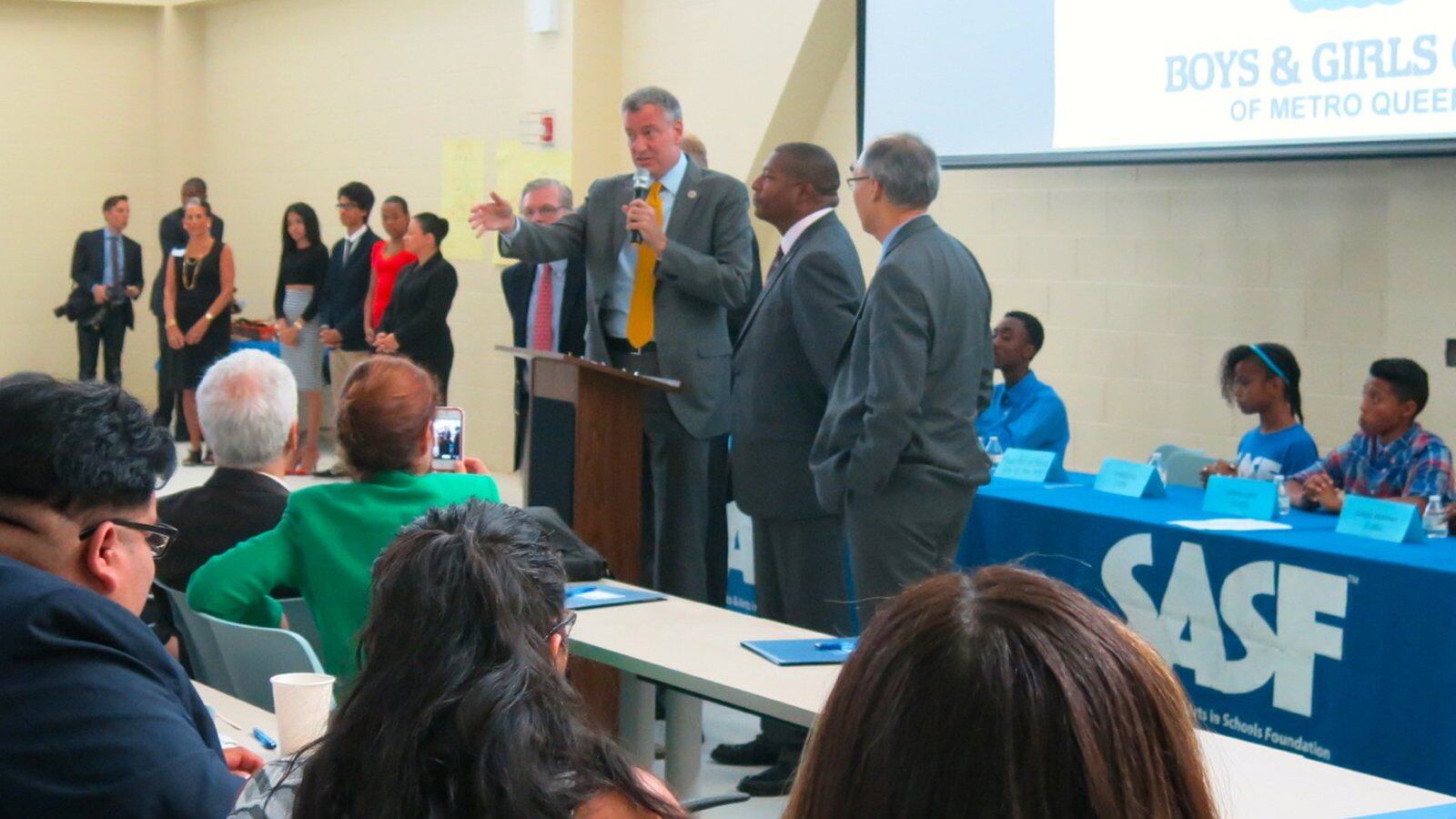 Mayor Bill de Blasio addresses new after-school staff.