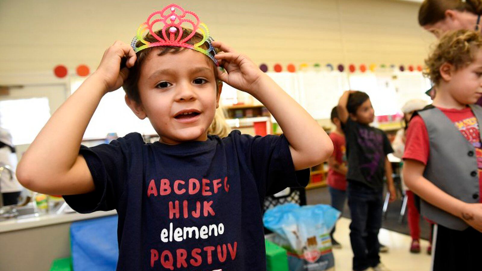 Ivan Ramirez Boyes, 5, plays dress-up during play time in the kindergarten class of Jenny Magee at University Hill Elementary School in Boulder.