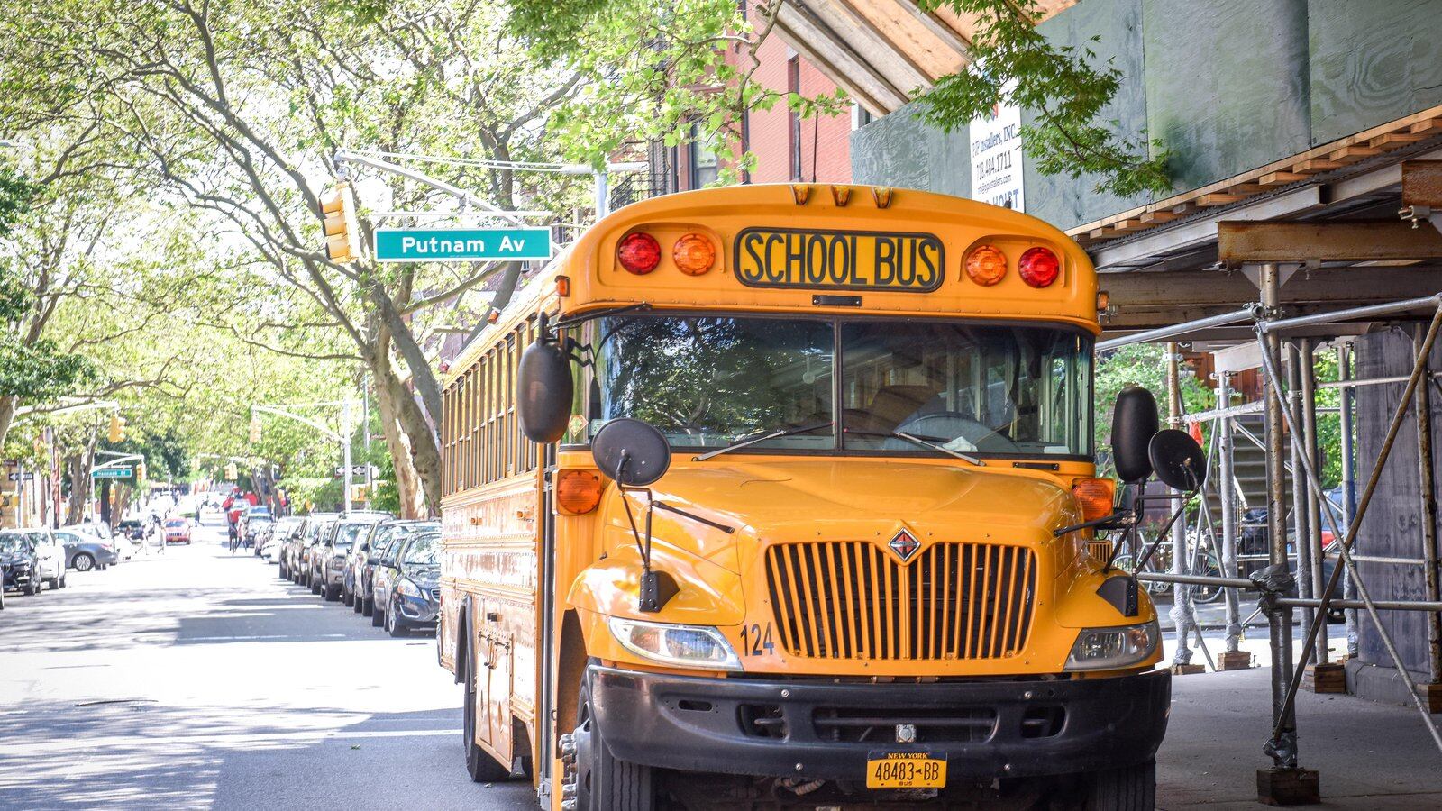 School bus outside Uncommon Schools Brooklyn East Collegiate Charter School, at 832 Marcy Ave., in Crown Heights, Brooklyn. Photo by David Handschuh/Chalkbeat; Taken May, 2019