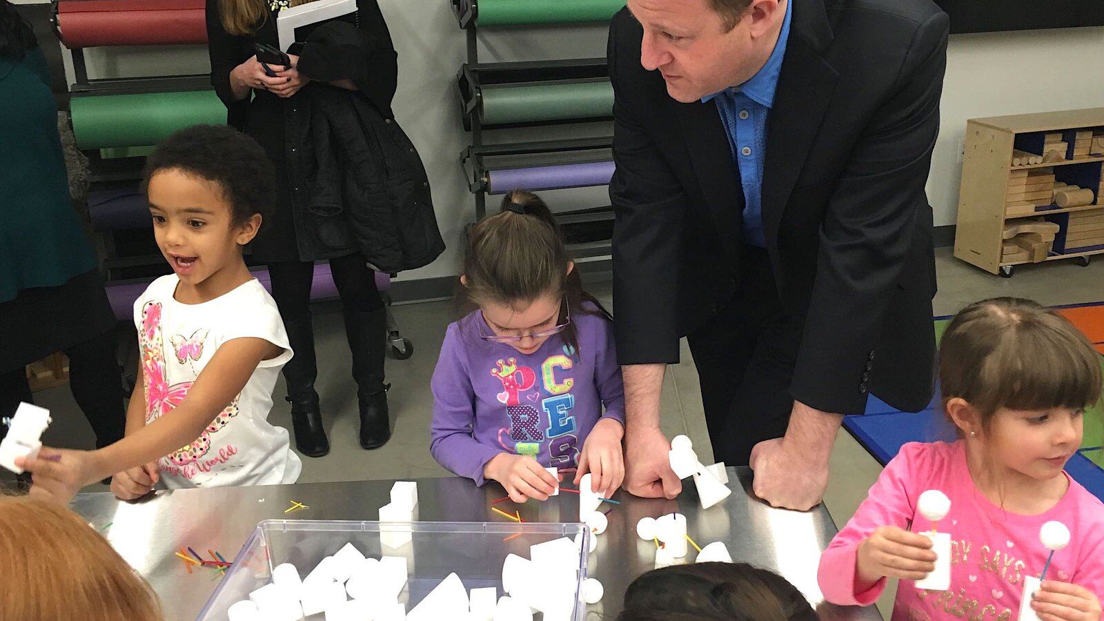 Colorado Gov. Jared Polis visits with preschoolers at the Maddox early childhood center in the Englewood school district in early 2019.