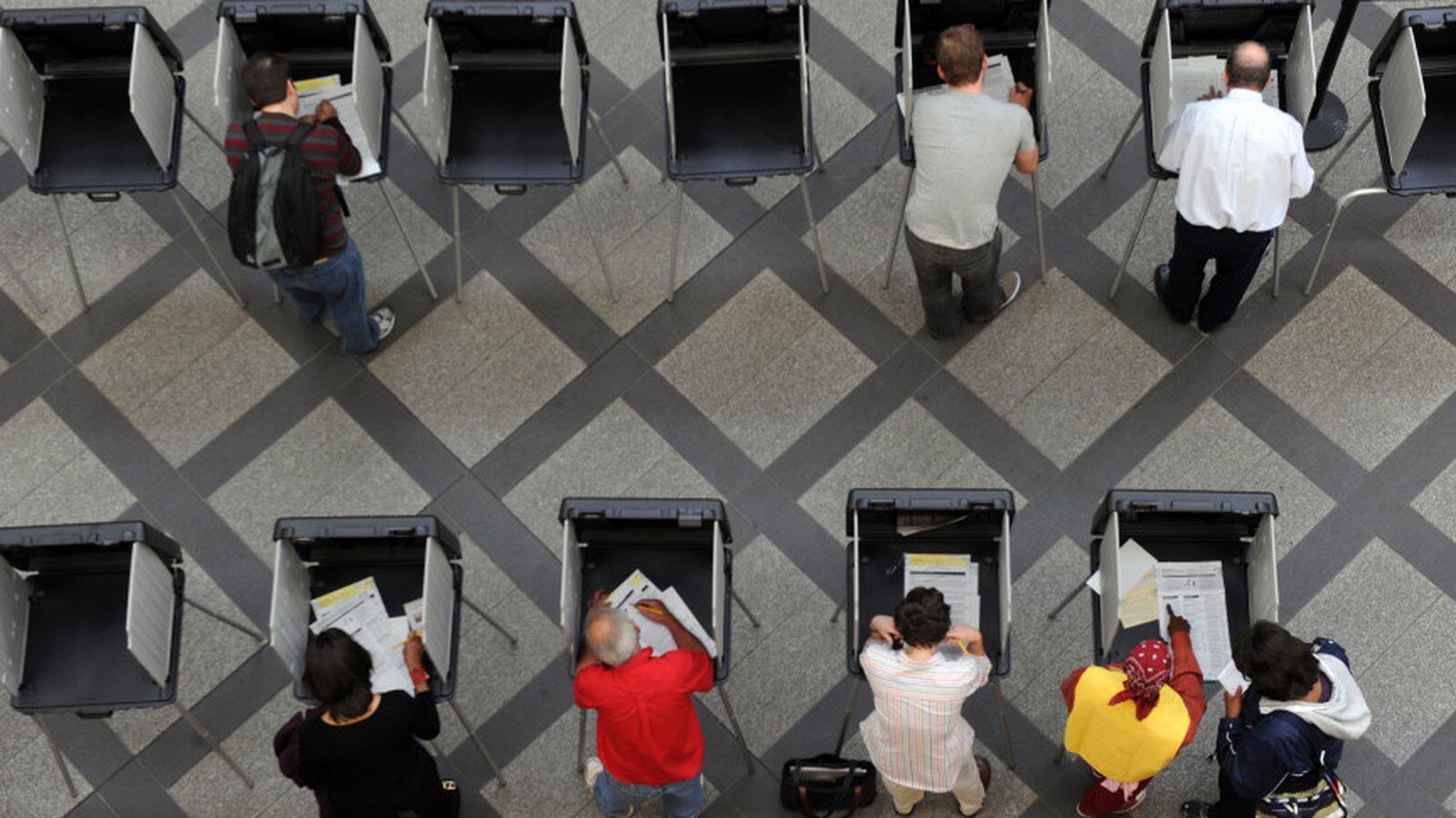 Denver voters fill out their ballot at the Webb municipal building.