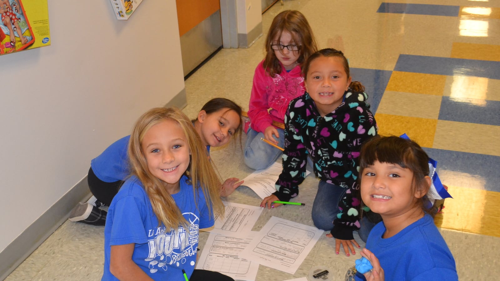 Second-graders at Las Animas Elementary work on a science experiment.