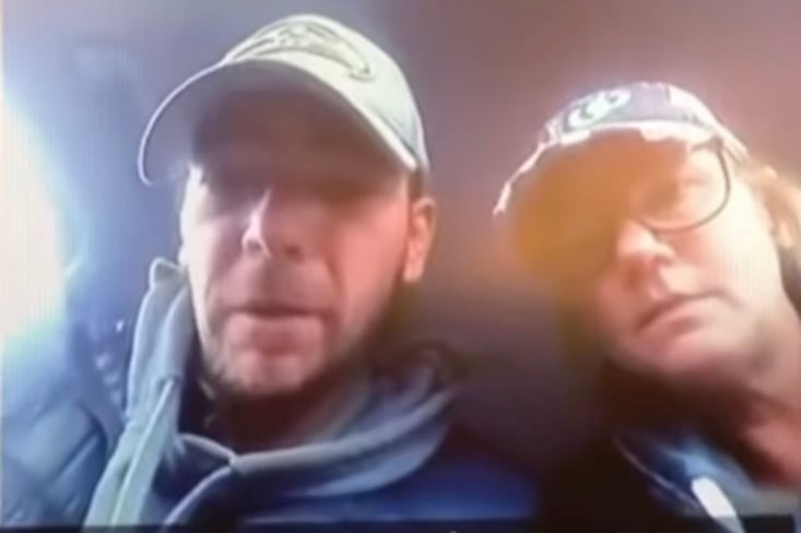 James and Jennifer Crumbley are shown on a screen during their appearance in Oakland County court when their son, Ethan Crumbley, was arraigned in the Oxford High School shooting.