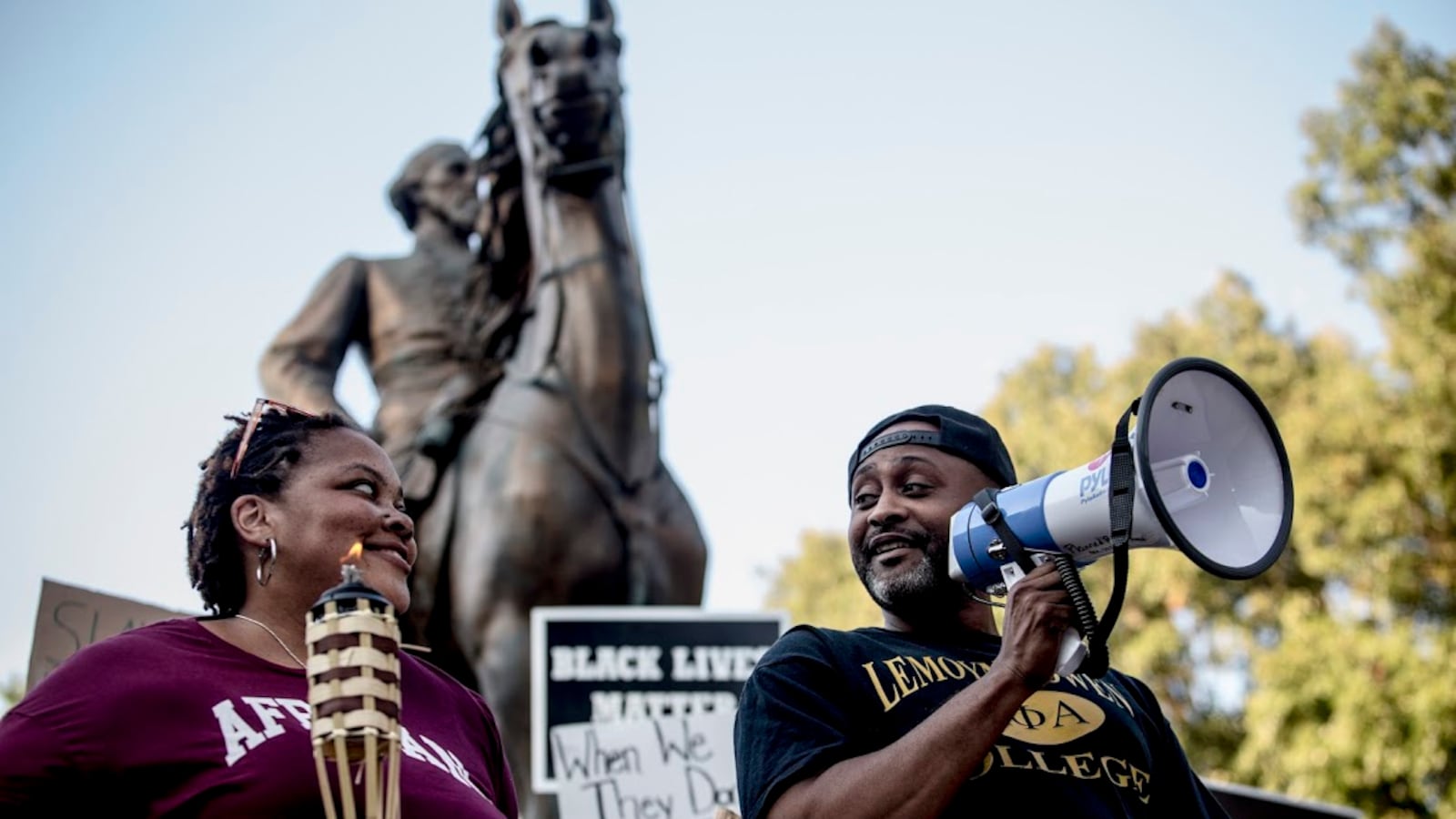 Tami Sawyer and Earle Fisher lead a rally in response to a white supremacist march in Charlottesville last weekend.