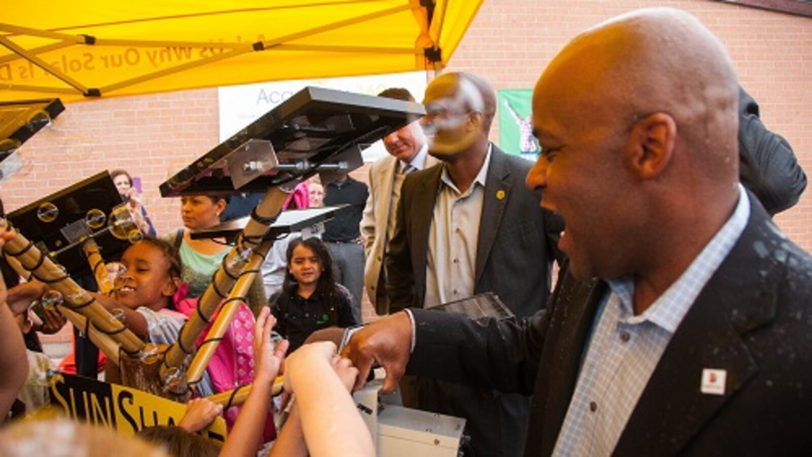 Denver Mayor Michael Hancock visited Academy 360 on Thursday for an announcement about the school's partnership with SunShare.