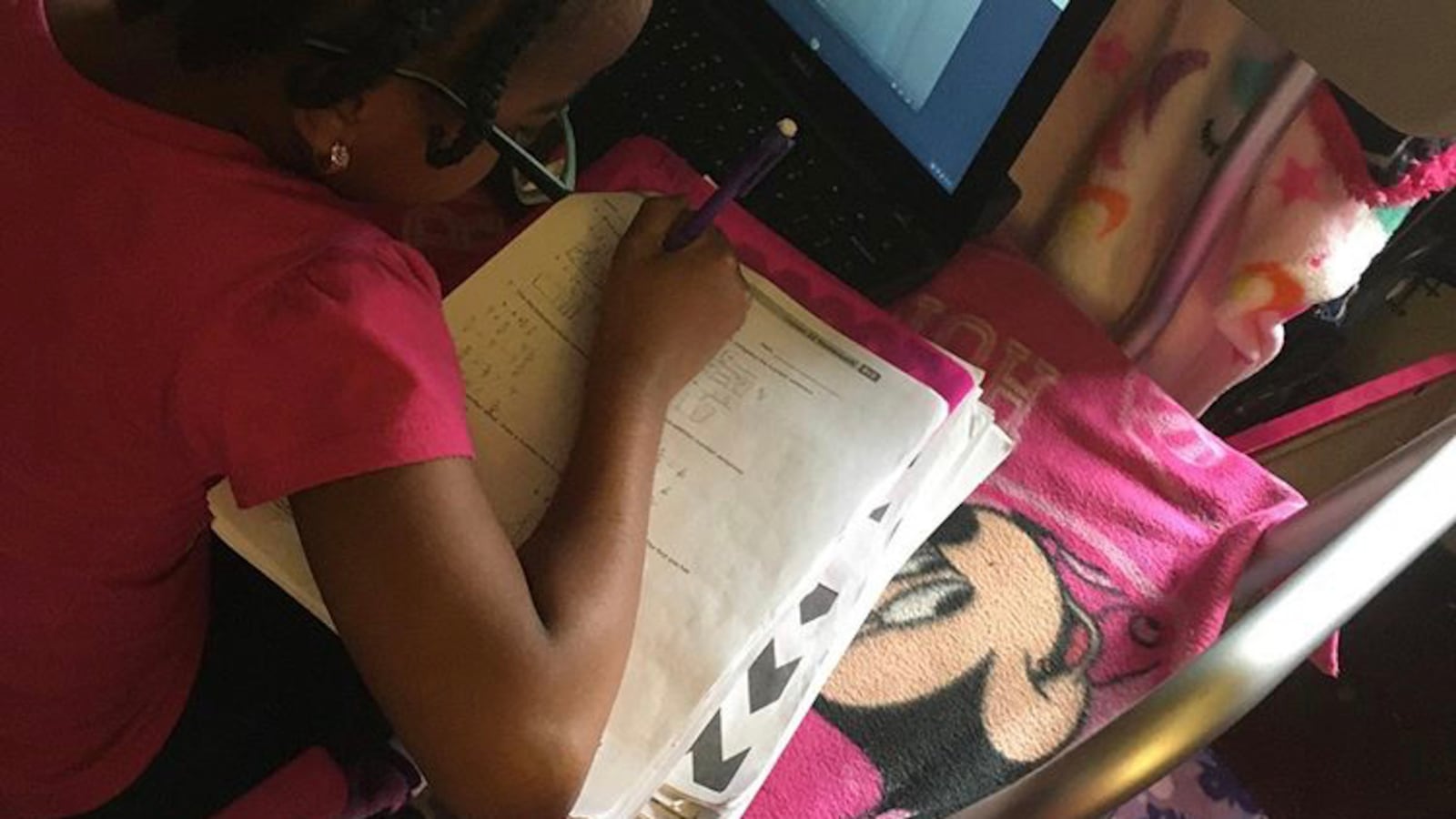 An East Harlem Academies student participates in remote learning. The charter network on Thursday announced classes would remain online for the rest of the school year.
