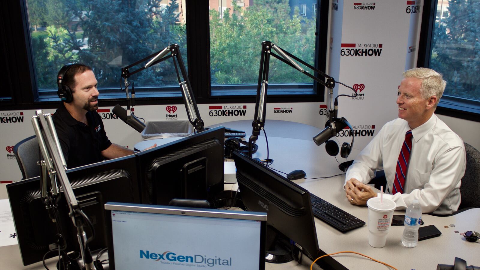 Radio host Ross Kaminsky, left, and Republican gubernatorial candidate George Brauchler before a telephone town hall Aug. 29. (Photo by Nic Garcia/Chalkbeat)