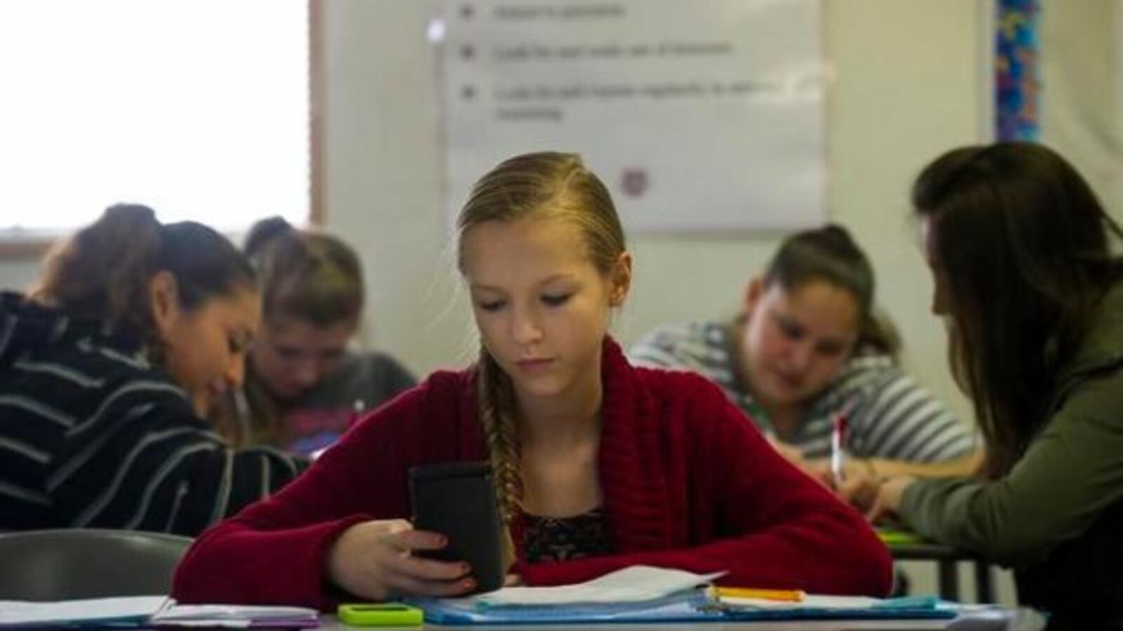A student works on her geometry homework during class at Brighton High School in Brighton on Nov. 12, 2015. (Denver Post file photo)