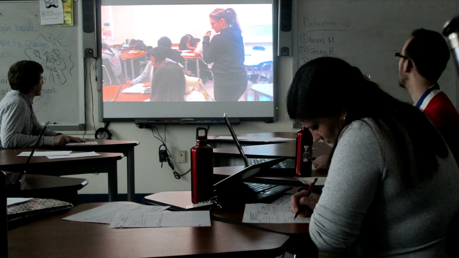 Teachers at Queens Metropolitan High School watched math teacher Michelle Varuzza's taped lesson during an after-school peer evaluation club.