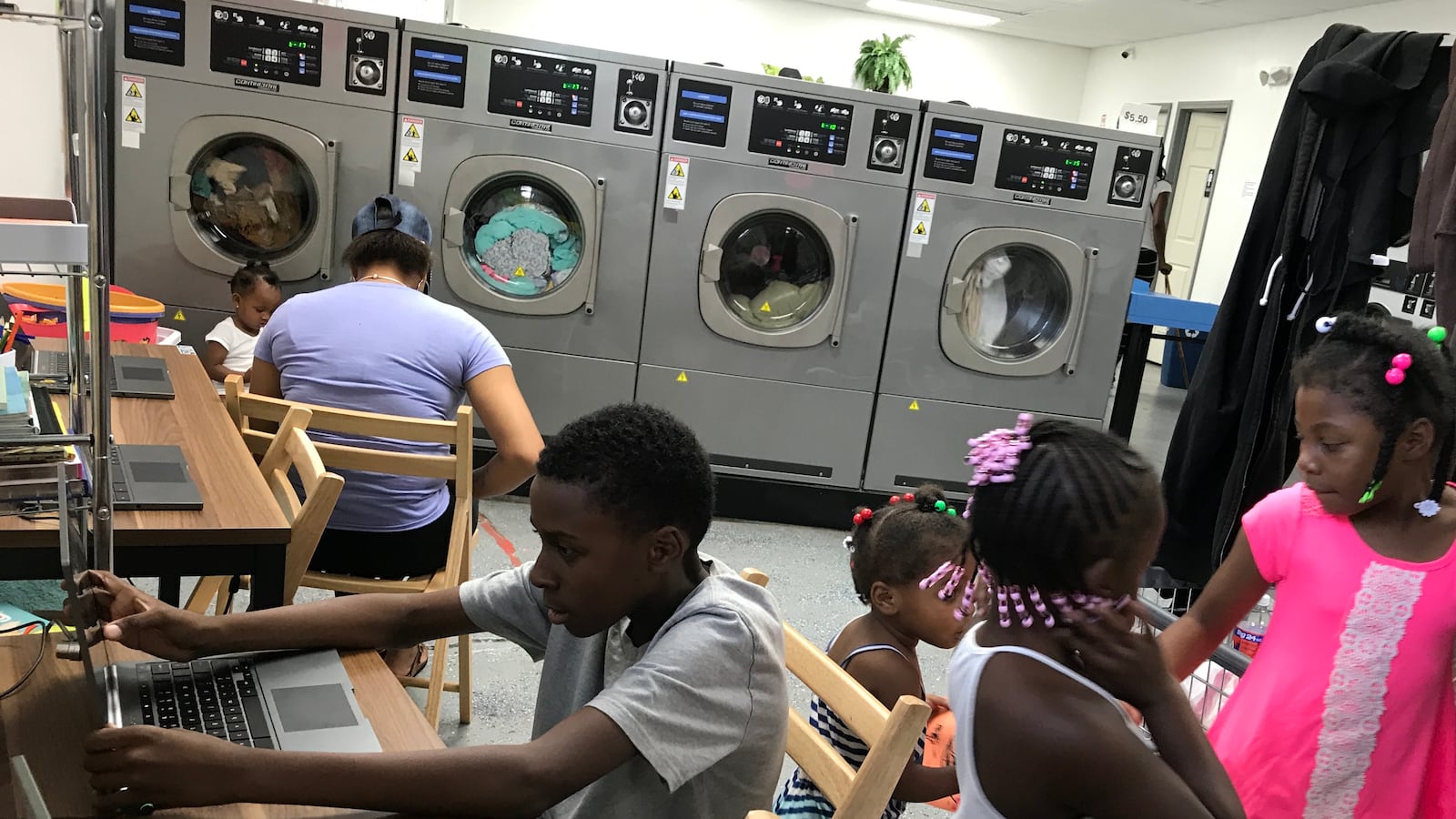 Children at Detroit's Fit and Fold laundromat now have computers to use and books to read while their parents do the wash — part of an effort to bring literacy programs to places where families are.