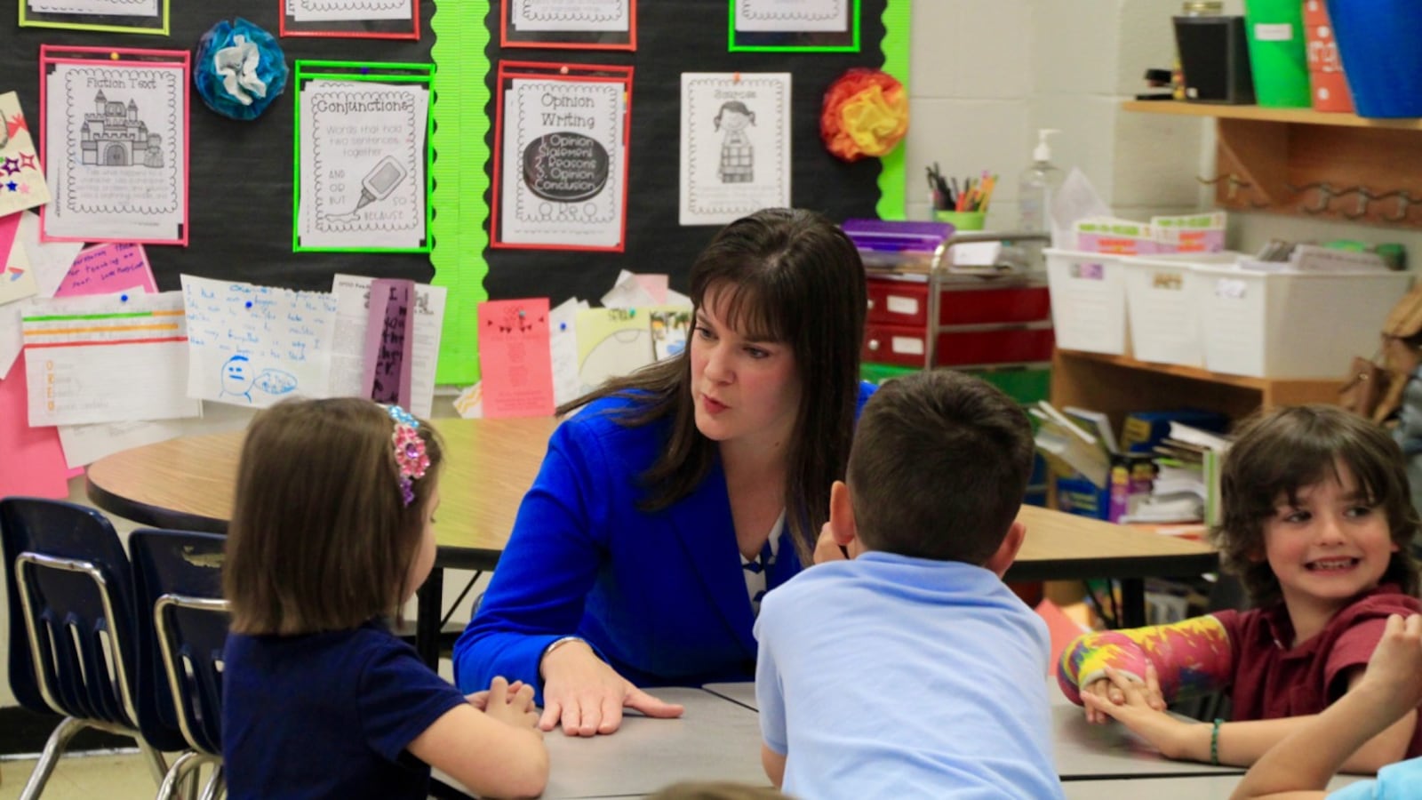 Education Commissioner Candice McQueen visits with students in April at Farmington Elementary School in Germantown.