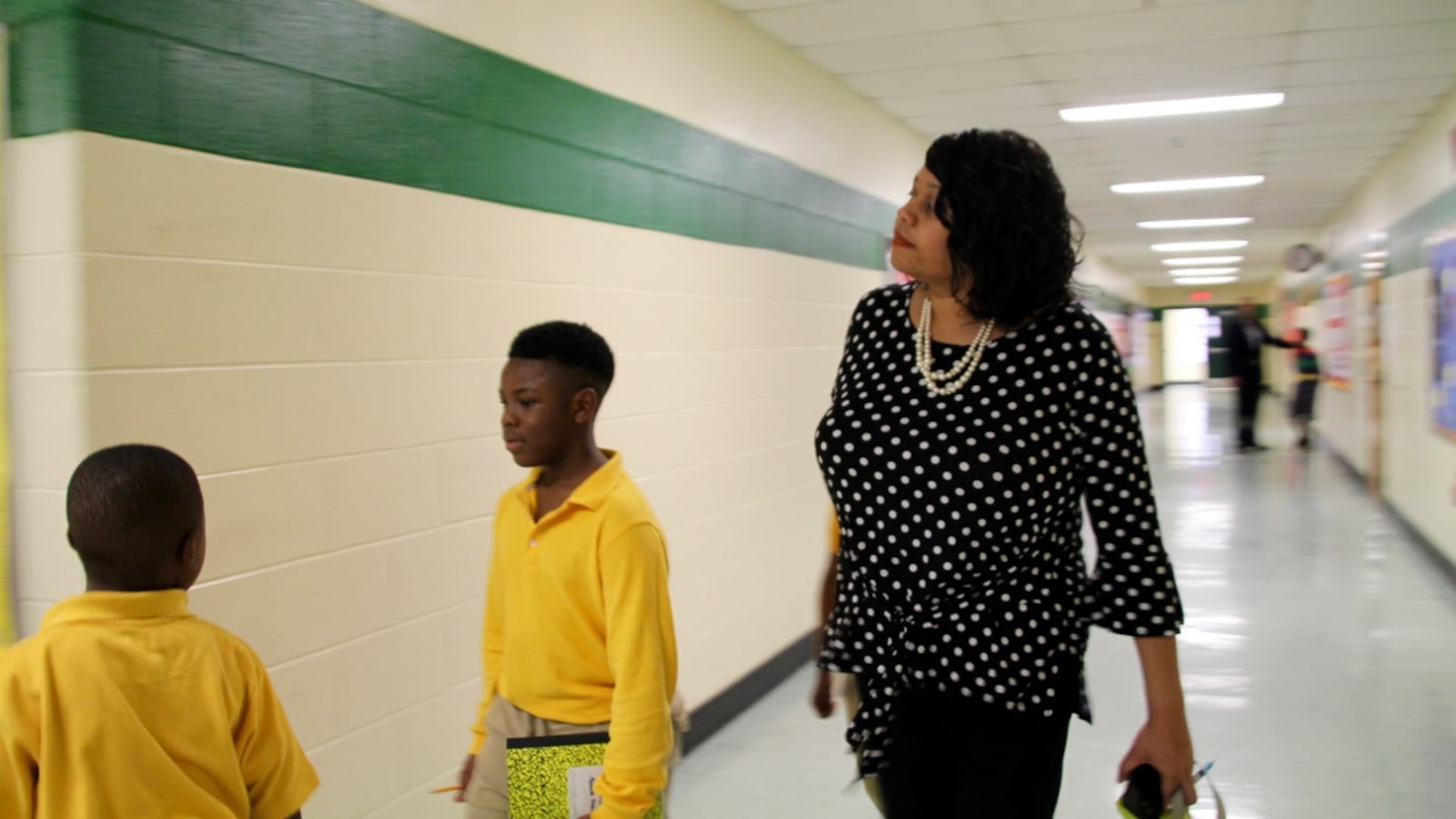 As a principal, Yolanda Dandridge said she walks almost 14,000 steps a day — double the national average.