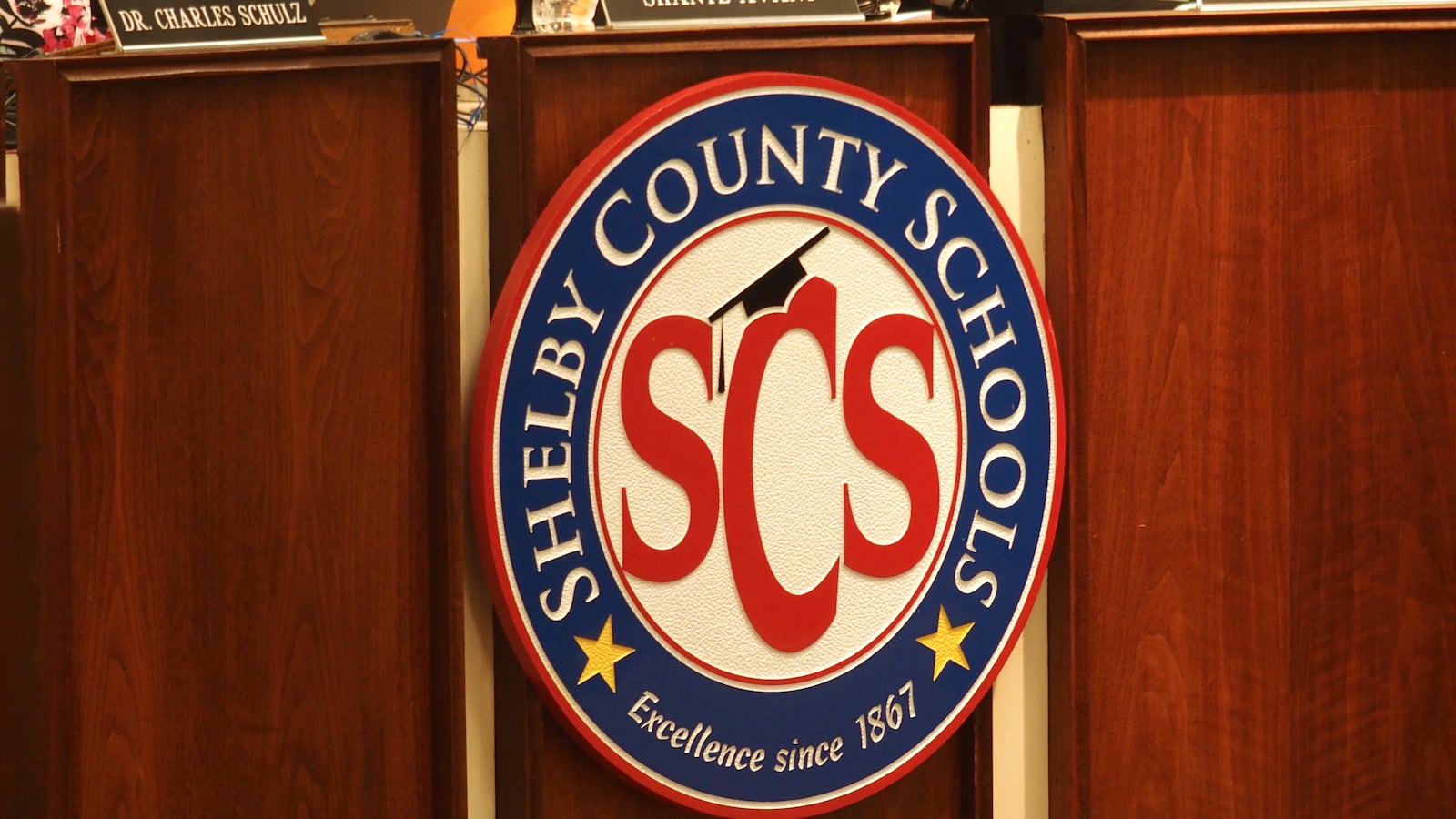 Shelby County Schools logo, SCS surrounded by a white circle, enclosed by a blue circle reading “Shelby County Schools.”