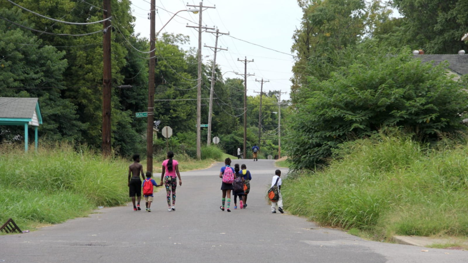 Children at Riverview walk home from school. (2015)