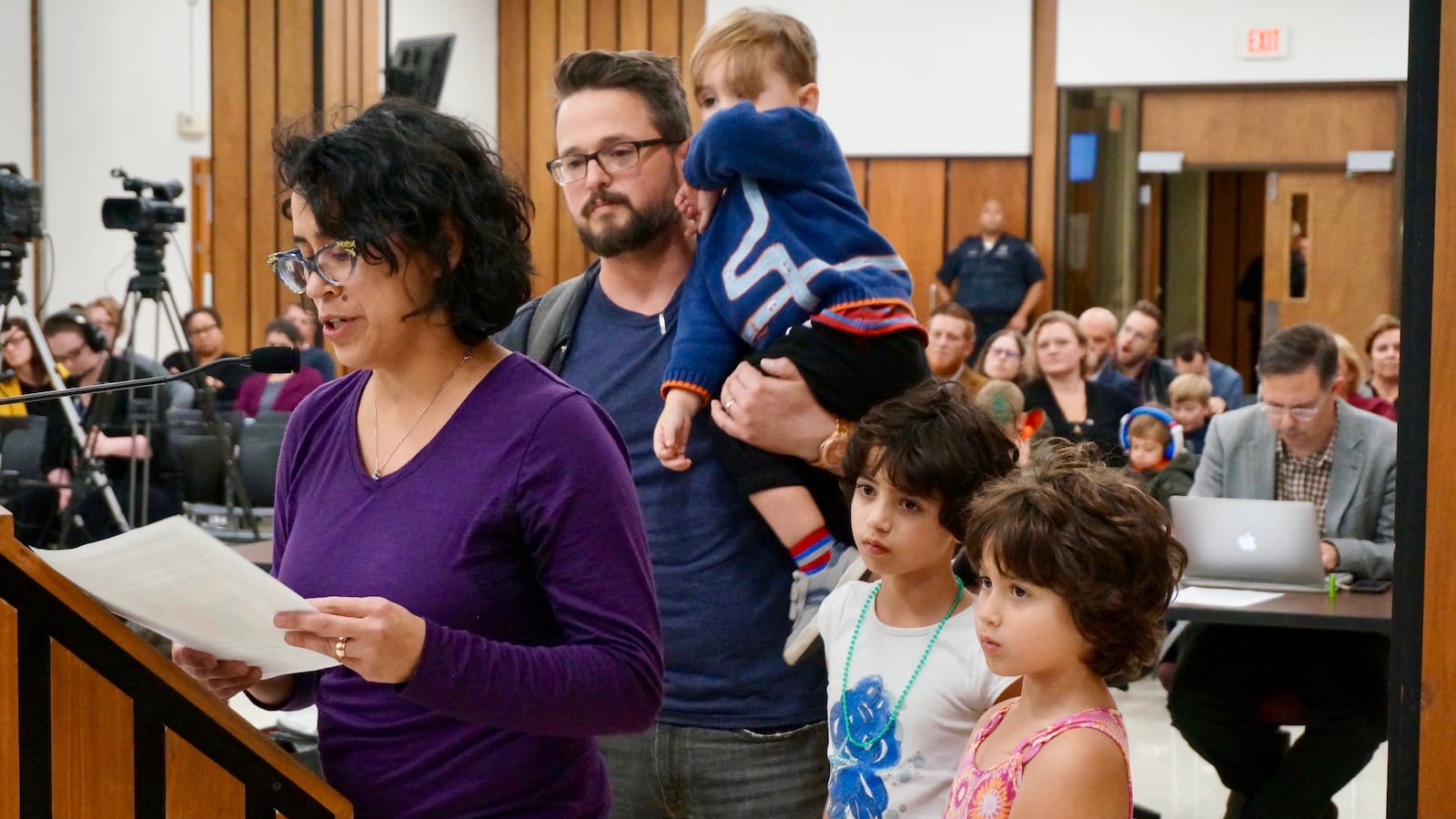 Luba Winship and her family live on the east side in the boundary of School 55. She is concerned that her youngest son may not be able to enroll at School 60.