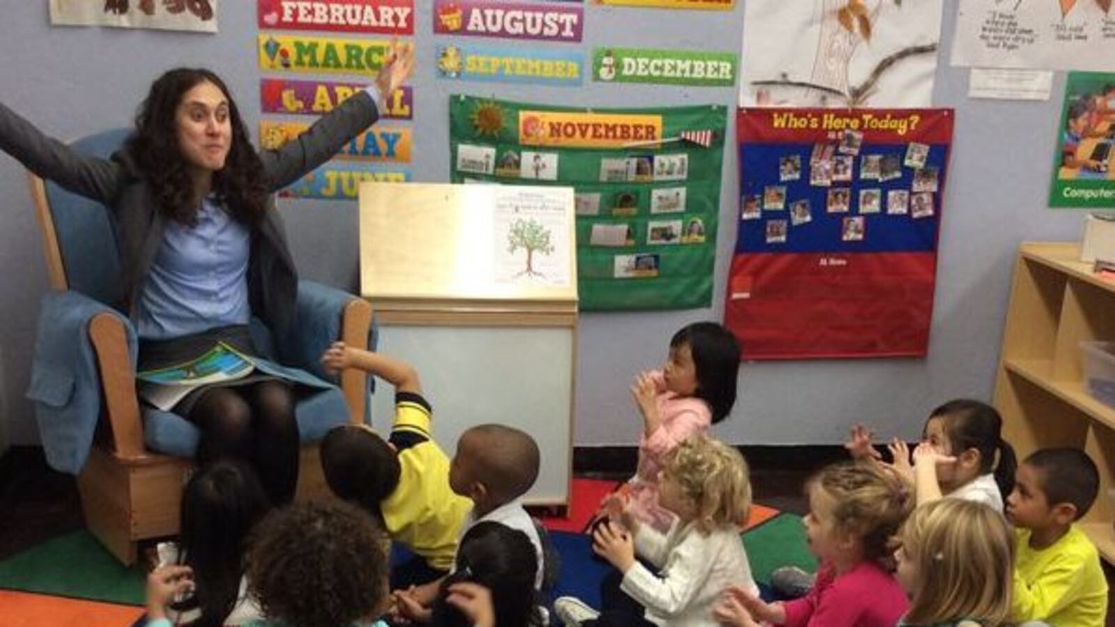 Sophia Pappas reads to a pre-K class.