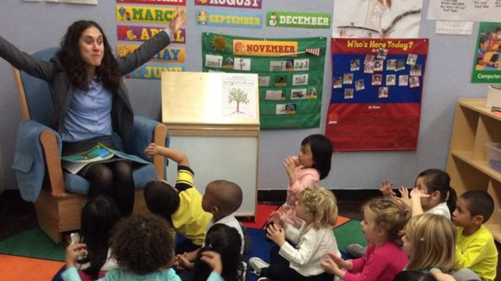 Sophia Pappas reads to a pre-K class.