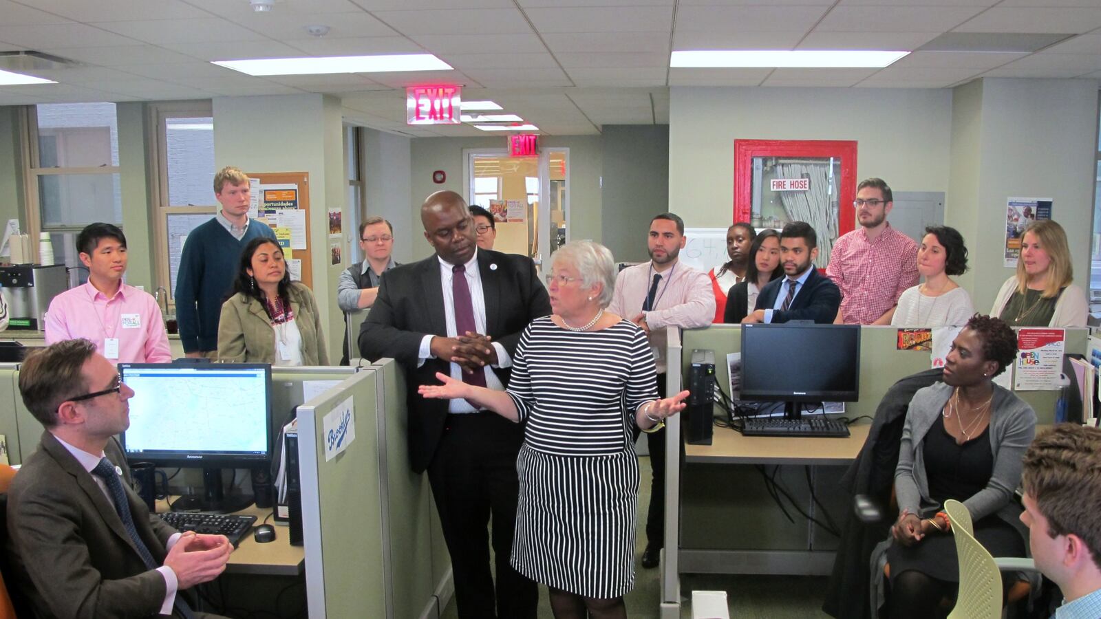 Carmen Fariña talks to members of the city's pre-K enrollment outreach team in 2015.