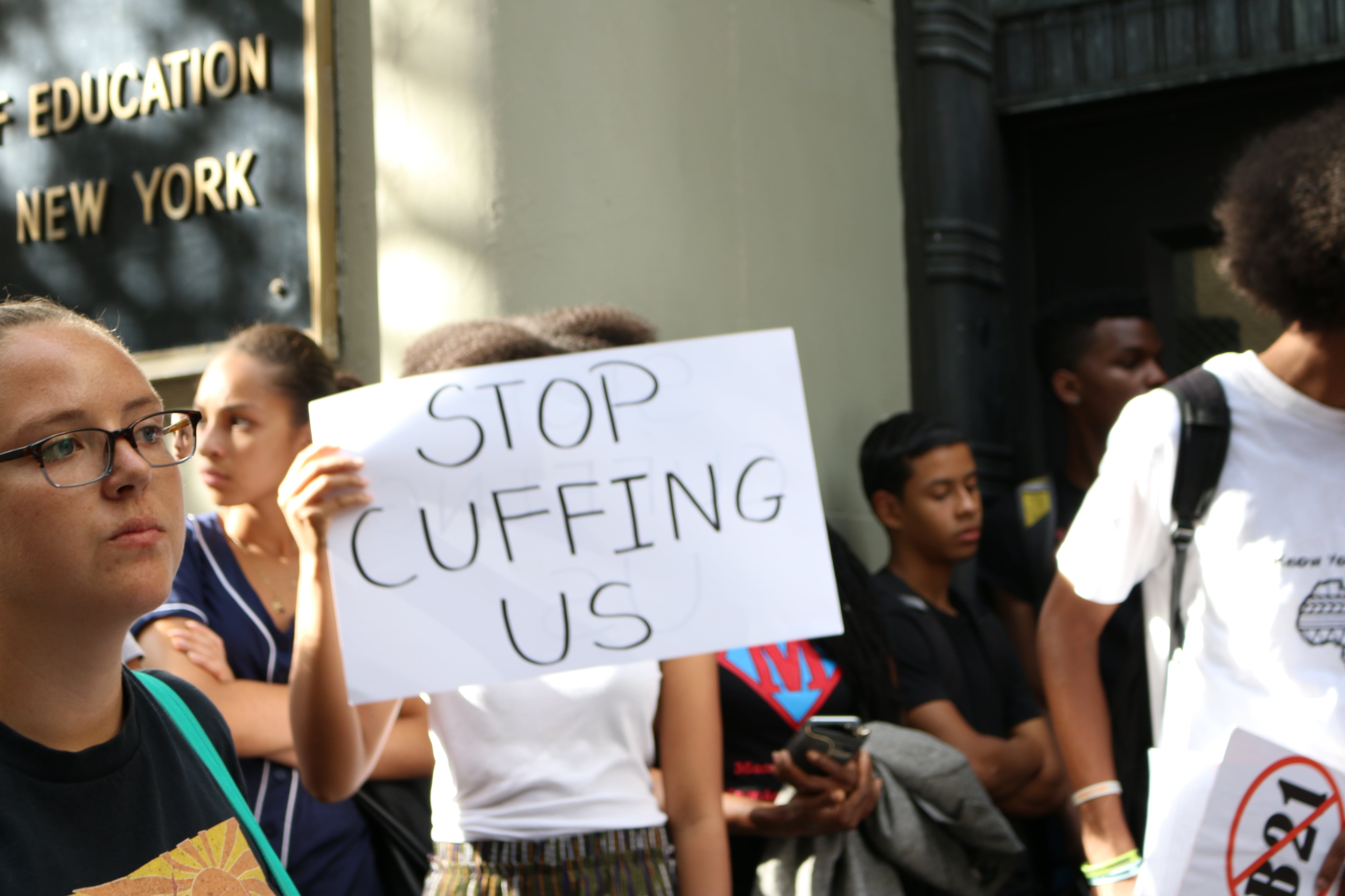 Advocates protest school suspension policies.