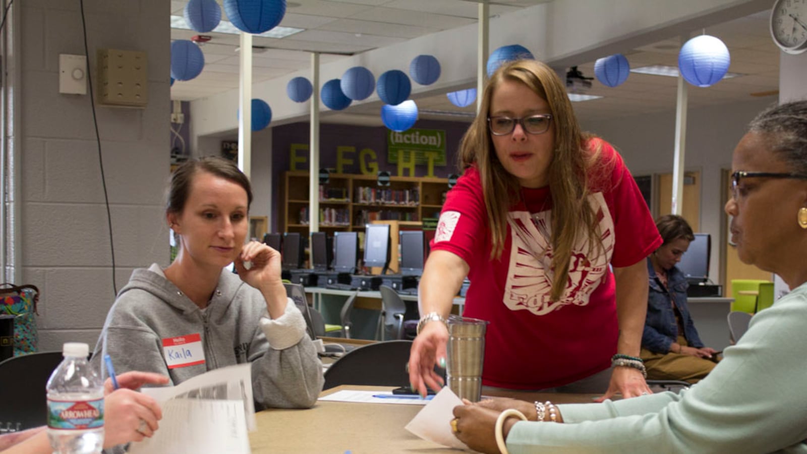 Rhiannon Wenning leads a community forum at Jefferson Junior-Senior High School in Edgewater.