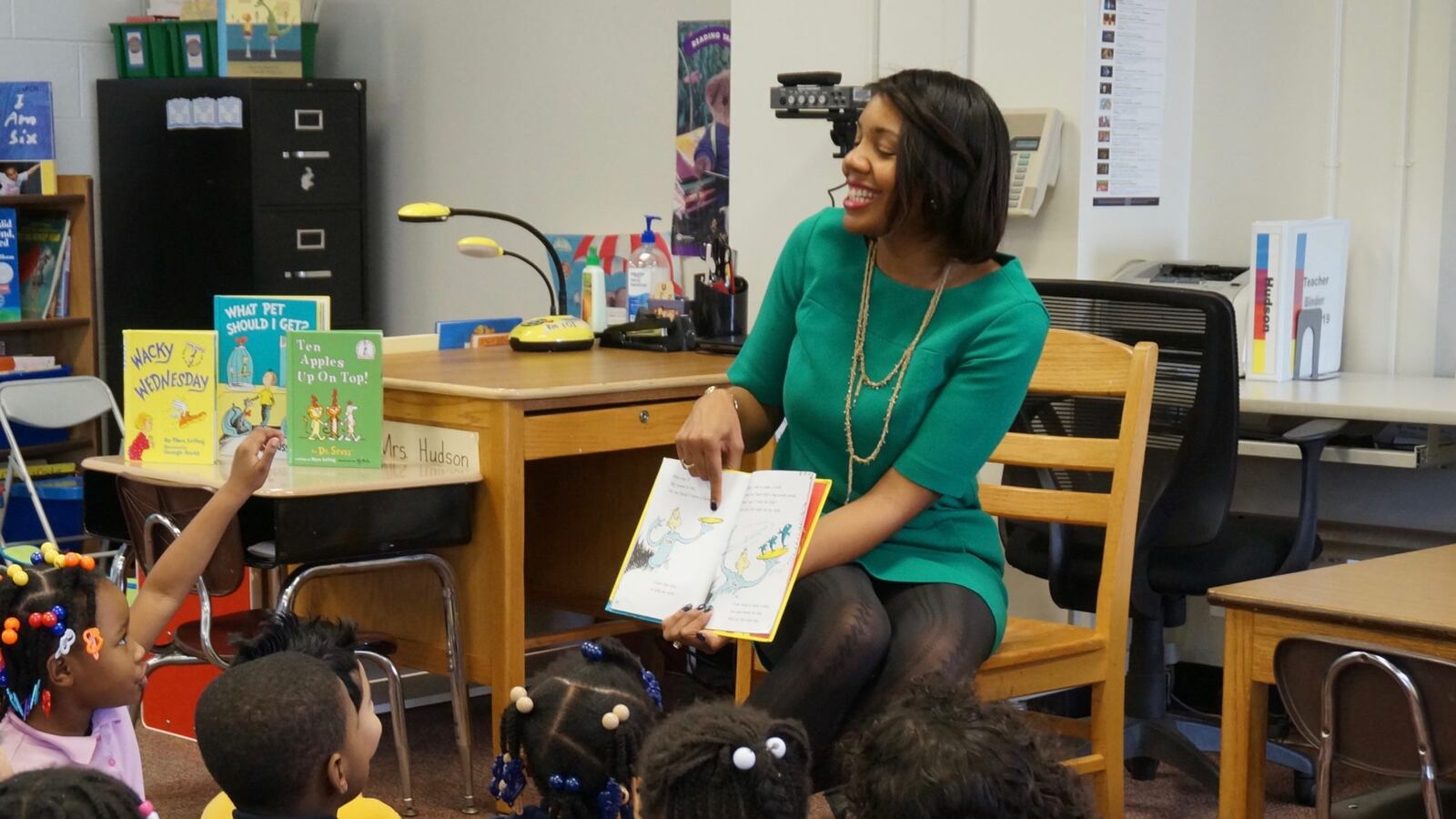 IPS interim Superintendent Aleesia Johnson reading to students at School 48