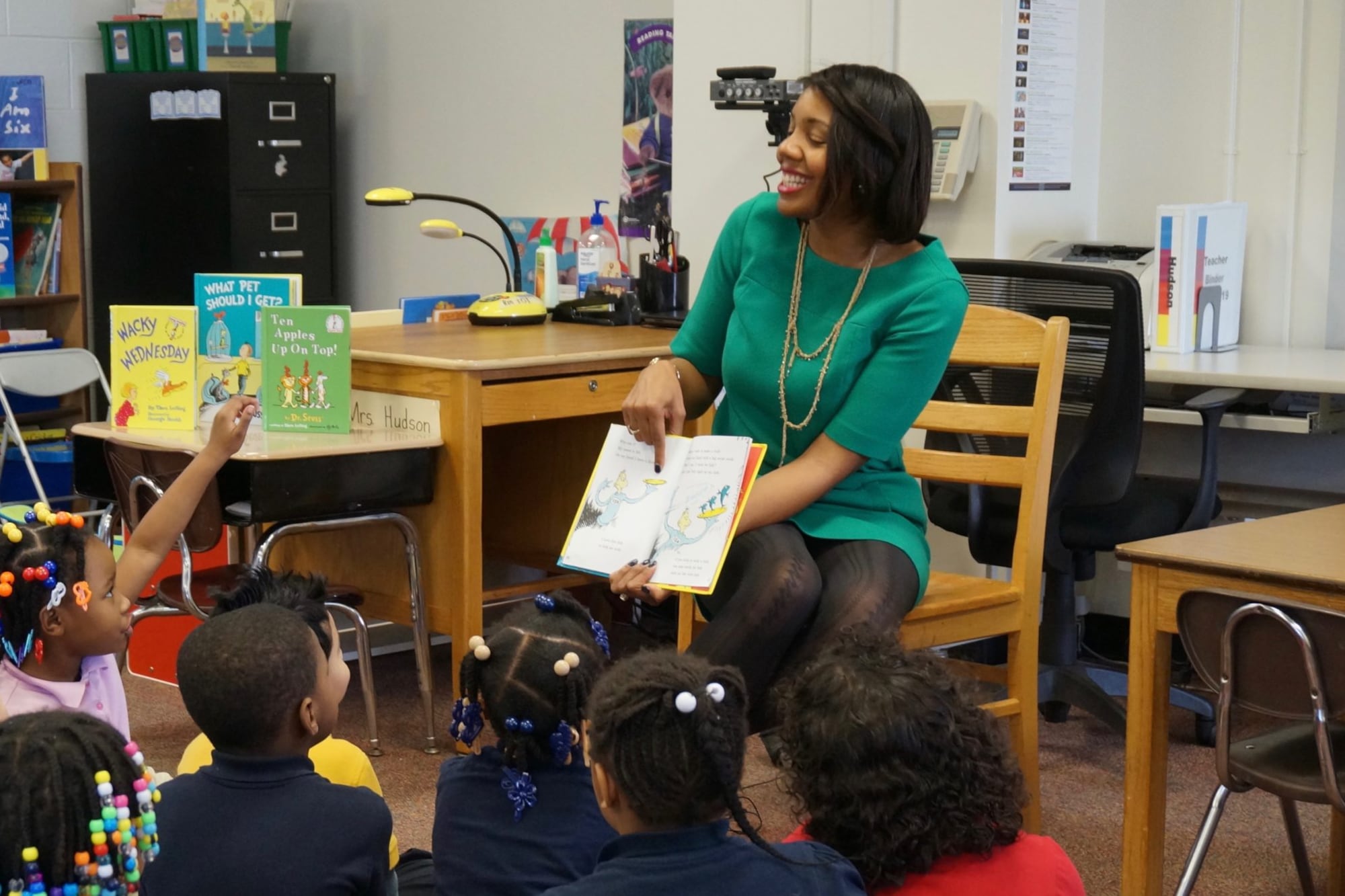 IPS interim Superintendent Aleesia Johnson reading to students at School 48
