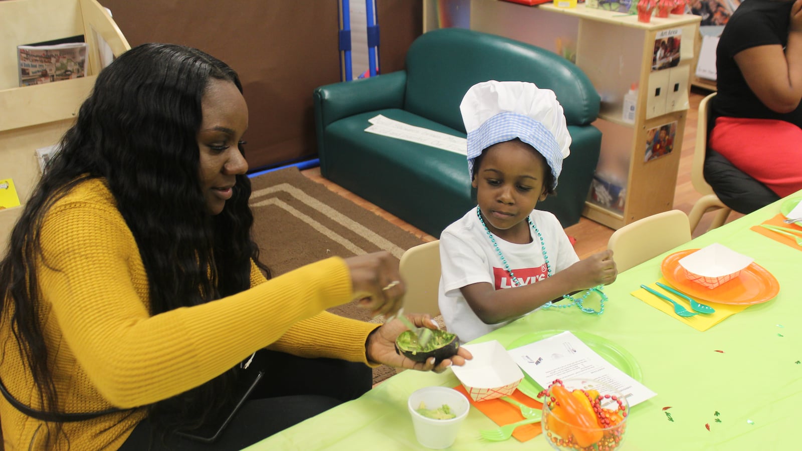 A teacher and student at Little Angels Family Center in Englewood