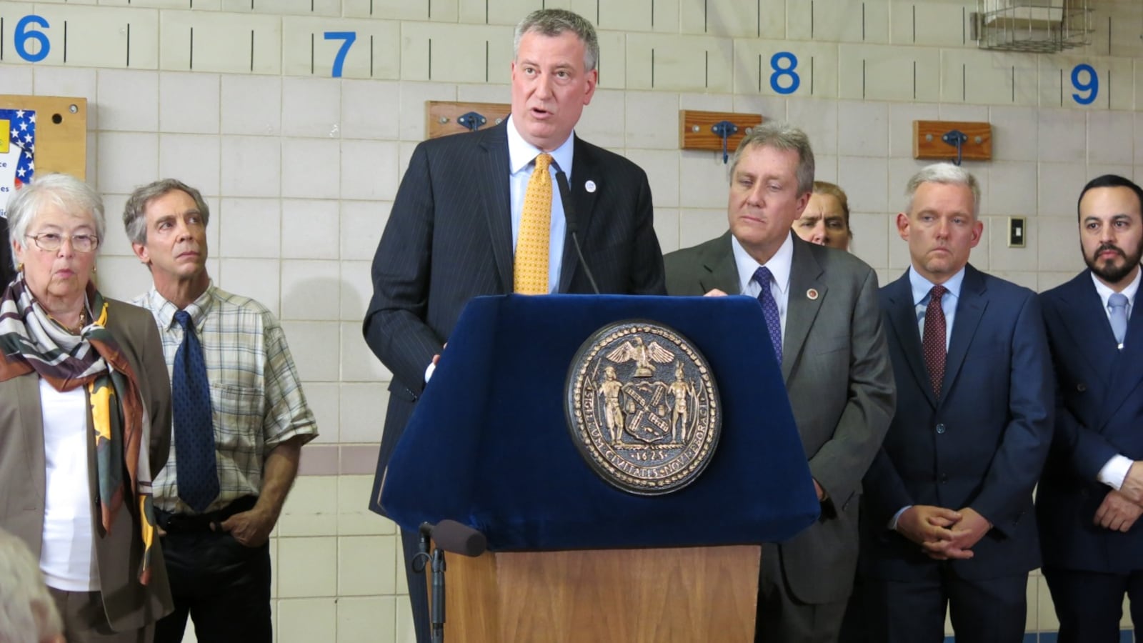 Mayor Bill de Blasio touted "important reforms" in his budget plan and the proposed teachers contract at a press conference Monday at P.S. 69 in Queens.