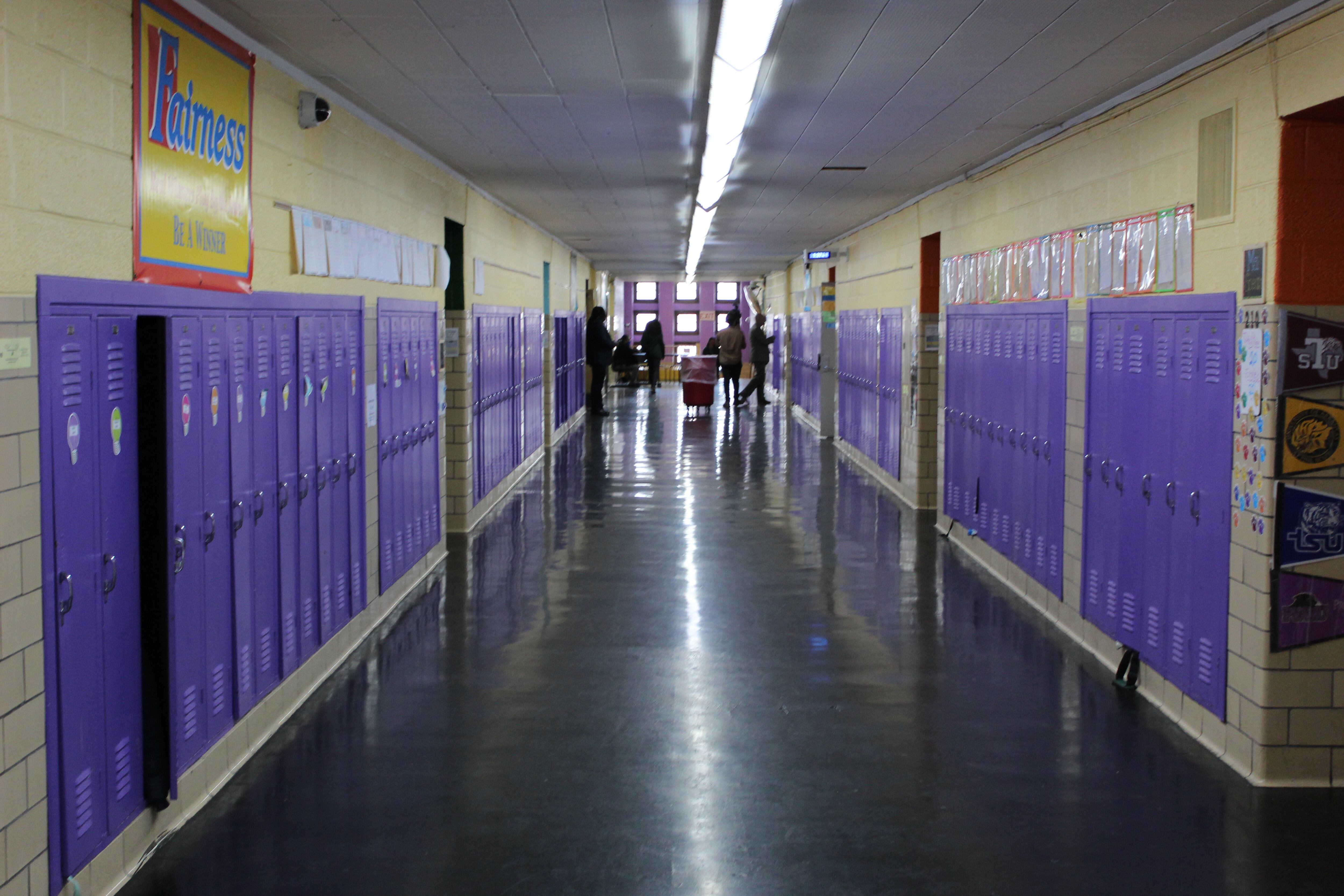 A empty school hallway.