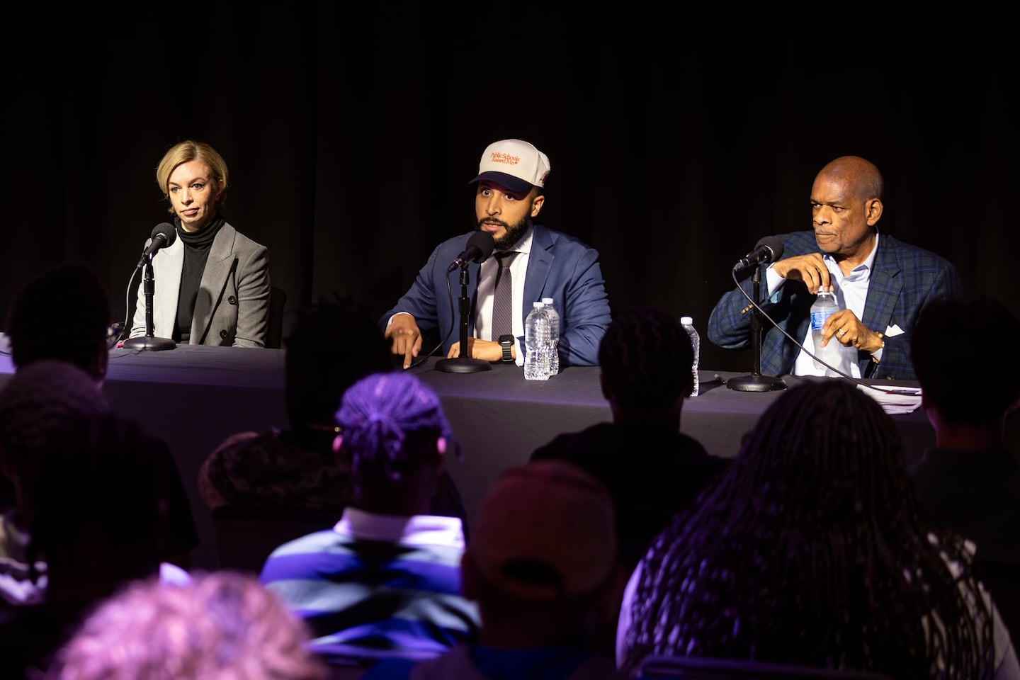 Victor Henderson (right), Hilario Dominguez (middle) and Jessica Biggs (left) answered questions at a Chicago school board president candidate forum hosted by WBEZ, Chicago Sun-Times and Chalkbeat Chicago on Wed., Oct. 14, 2026.