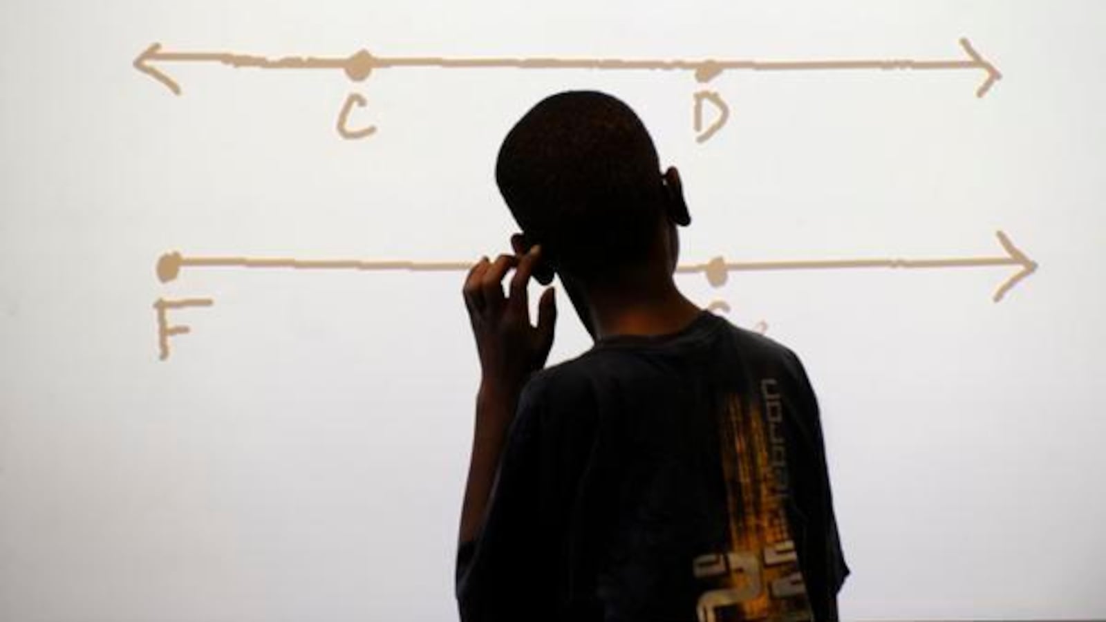 A Stedman Elementary student scratches his head as he considers a math problem.