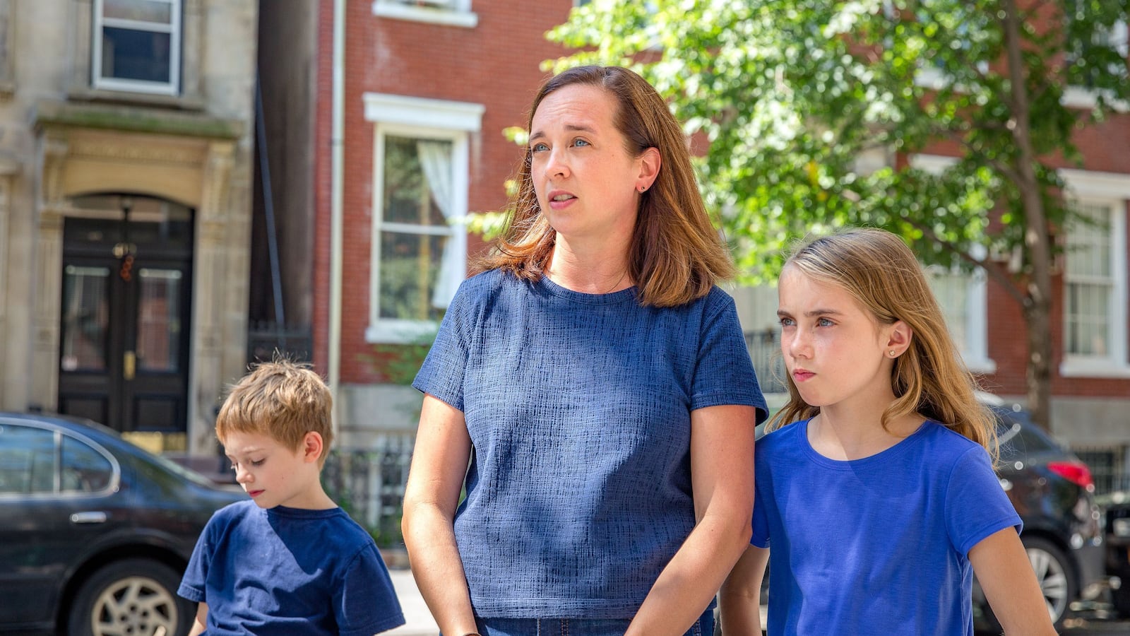 Laura Nest Wallace with her son Max and daughter Madeleine in front of PS 29, the children’s former school in Cobble Hill, Brooklyn.